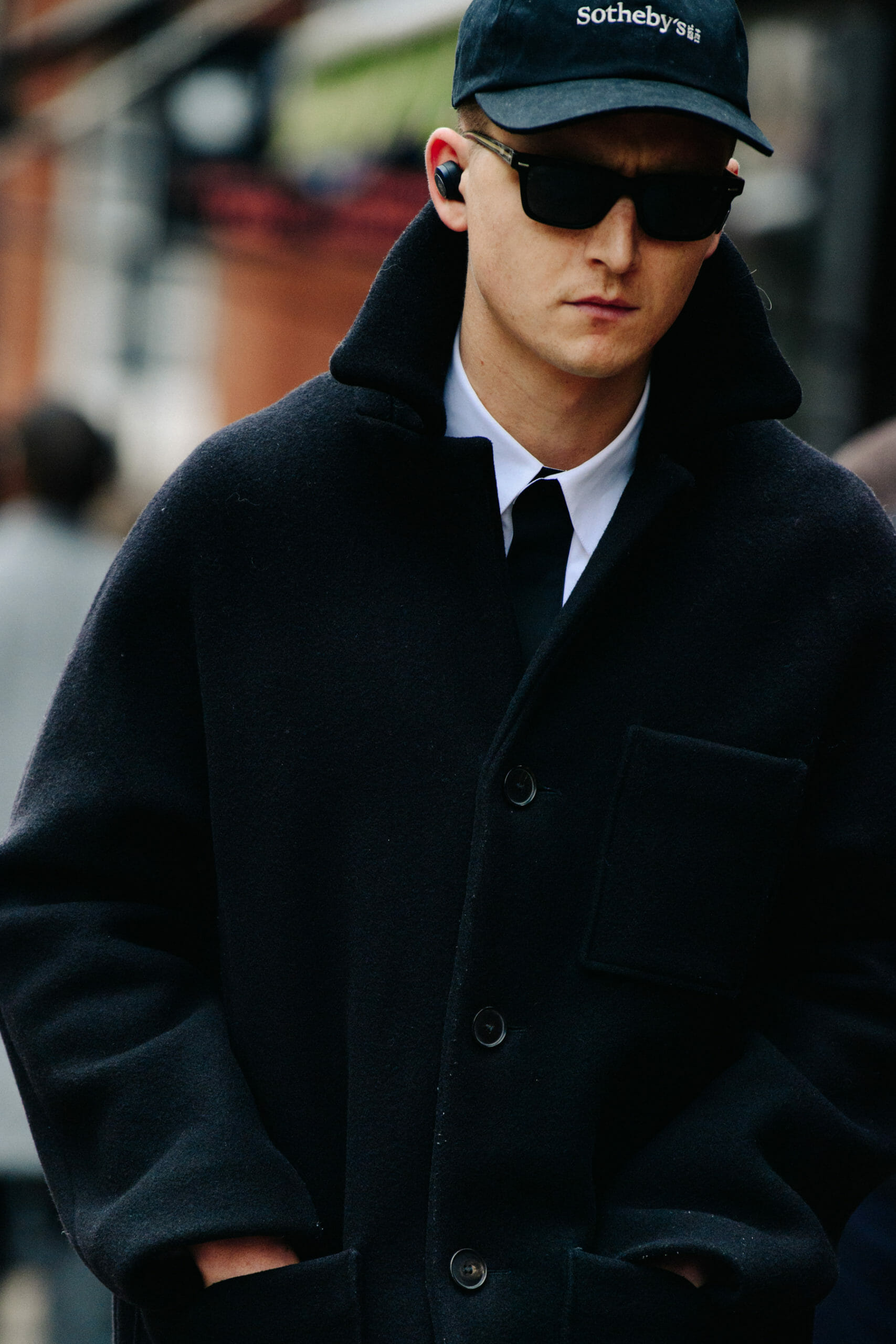 Man wearing black coat