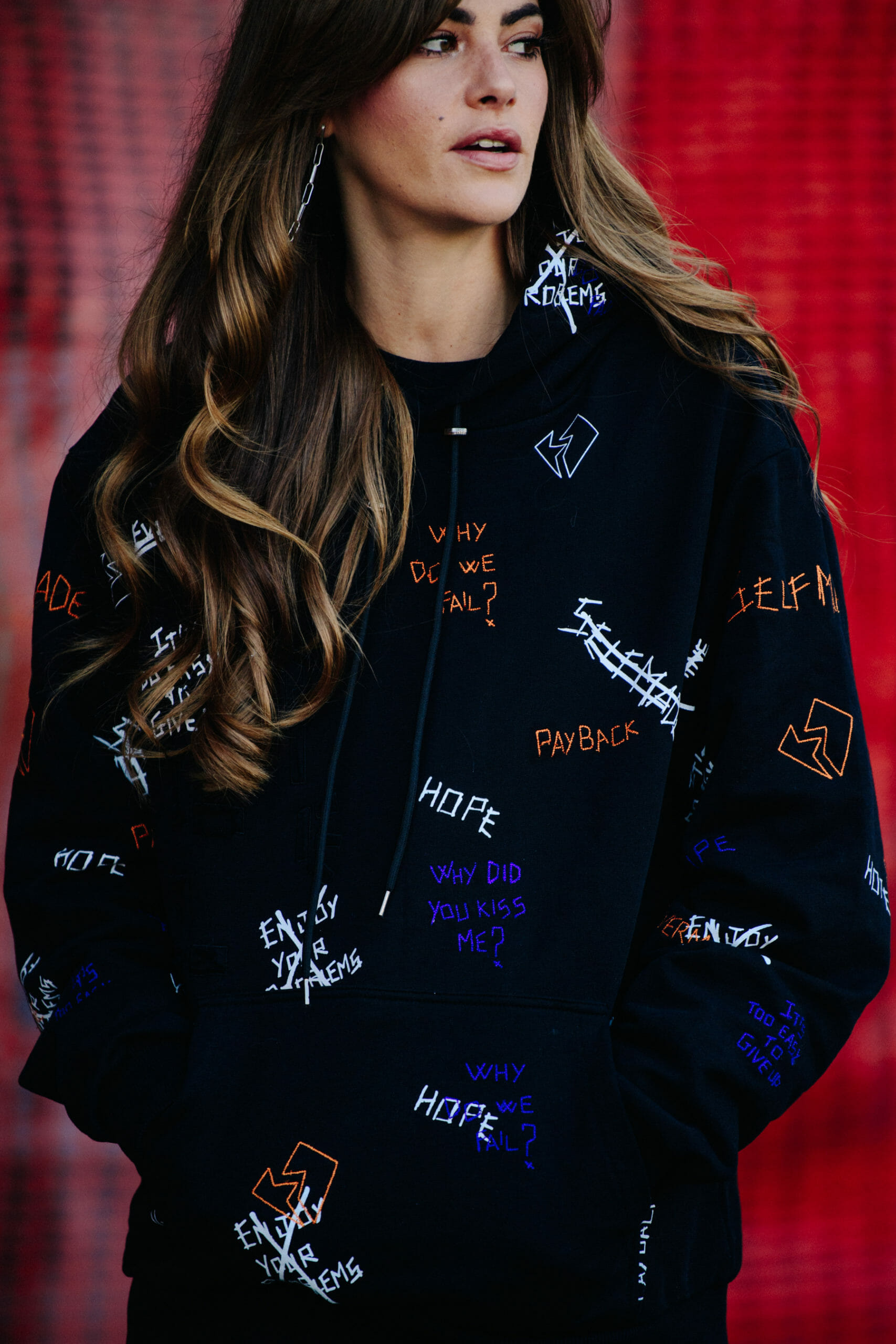 Woman wearing black hoodie
