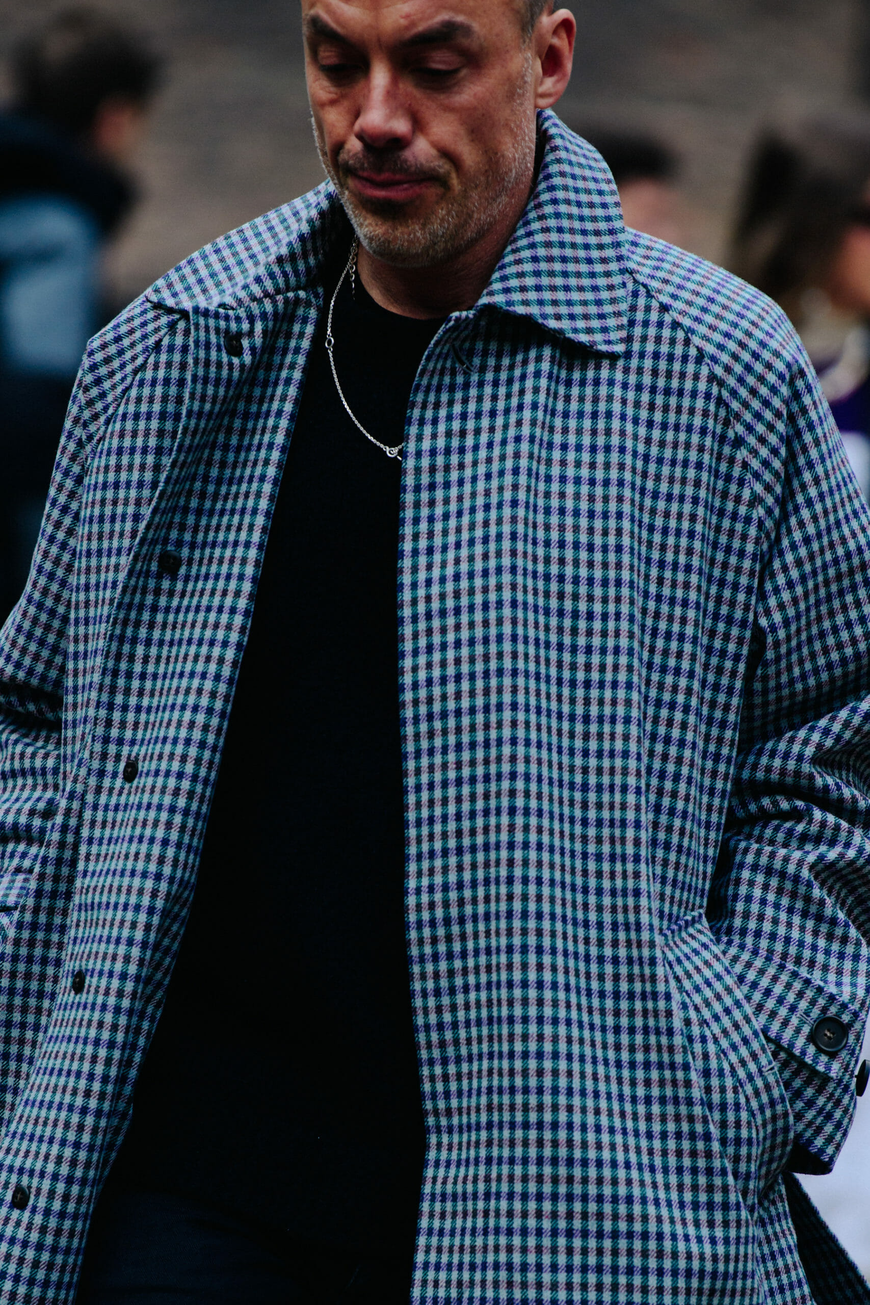 Swedish man wearing blue coat