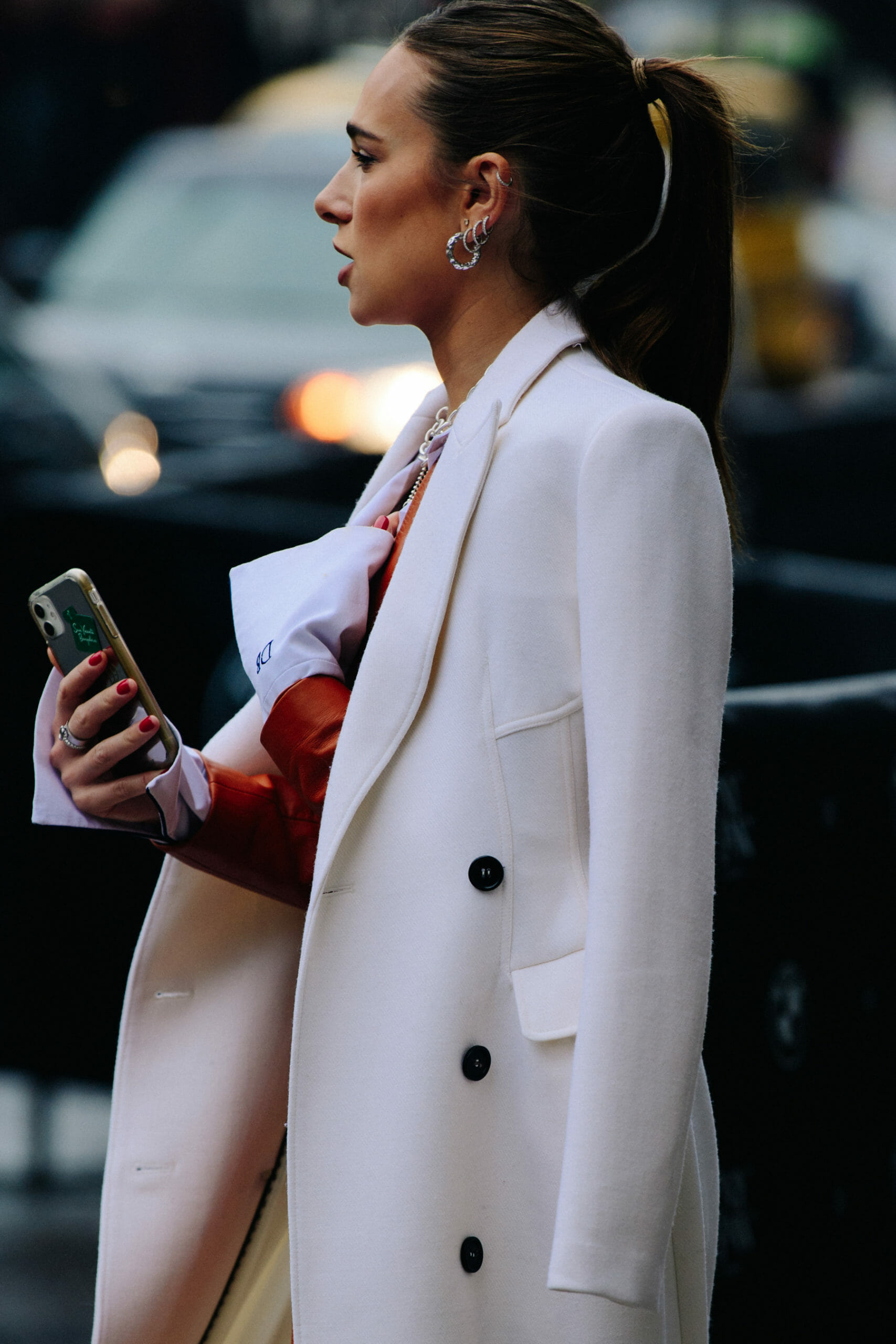 Blogger wearing white coat