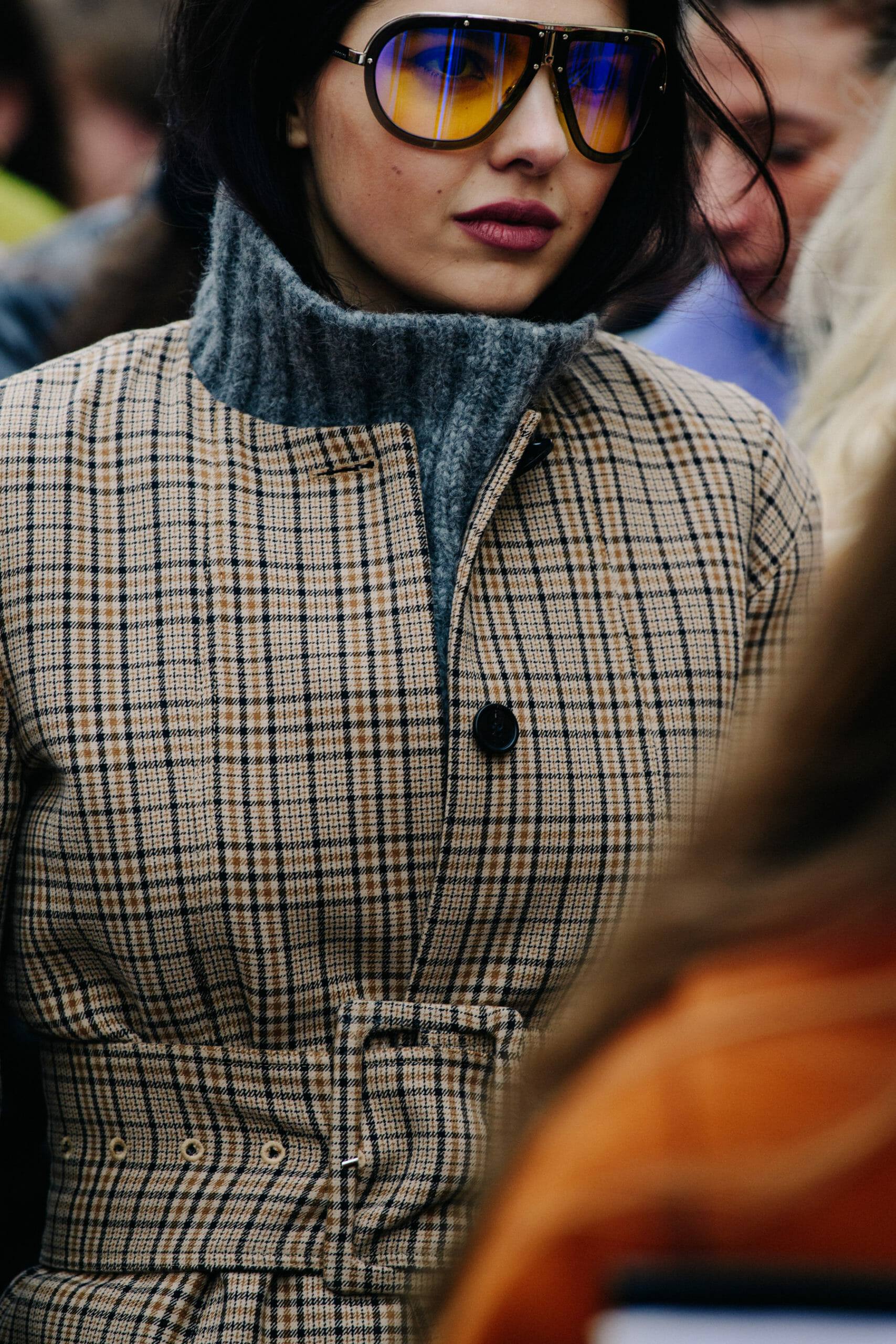 Woman wearing grey sweater