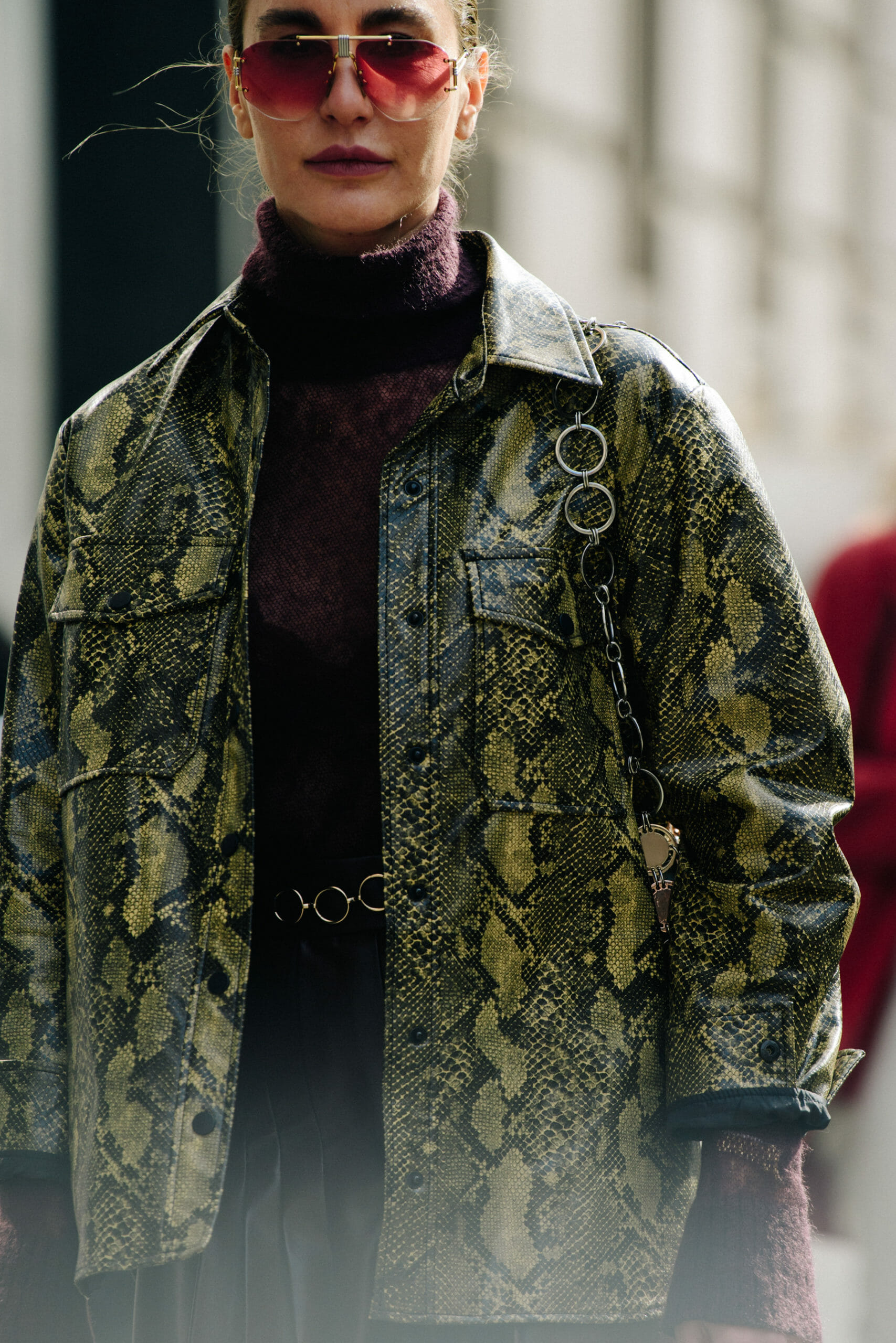 Woman wearing snakeskin jacket