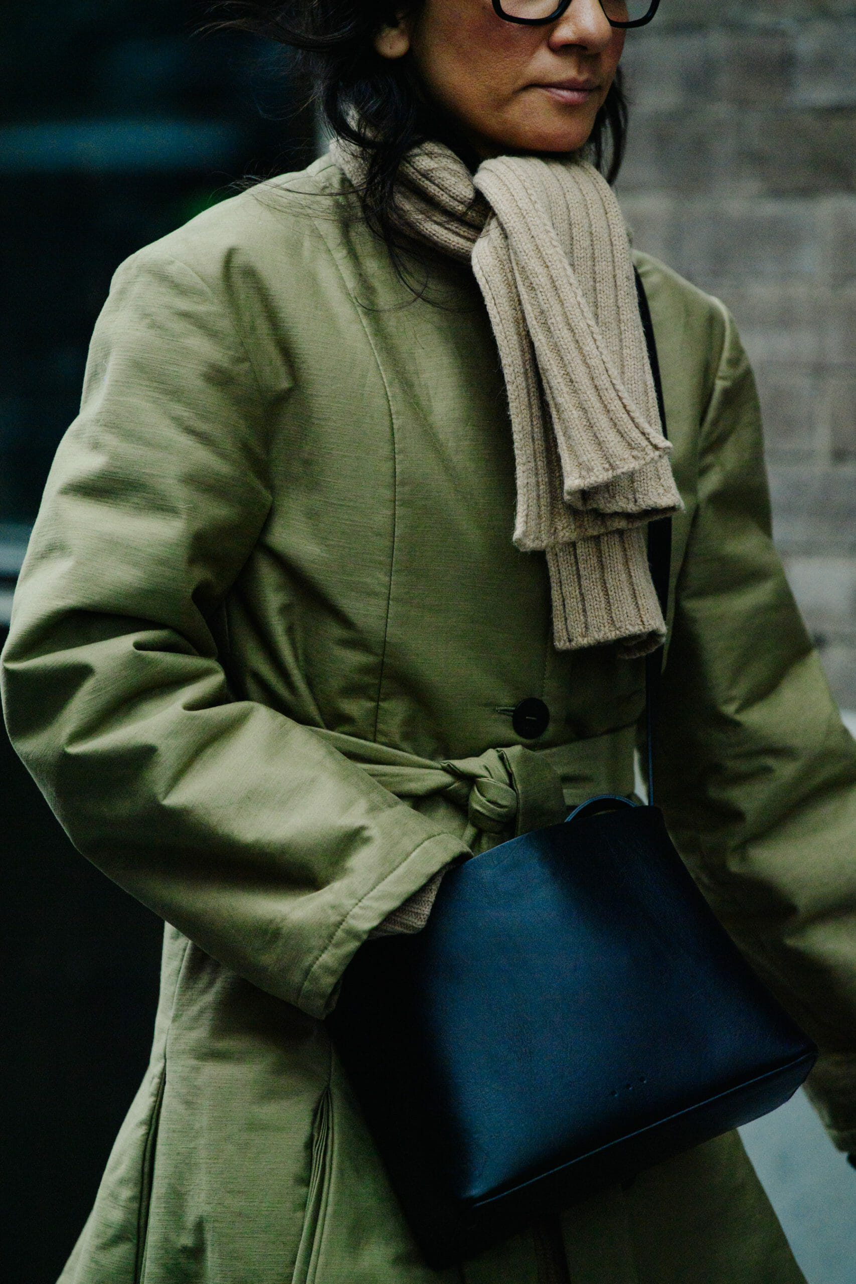 Woman wearing green coat