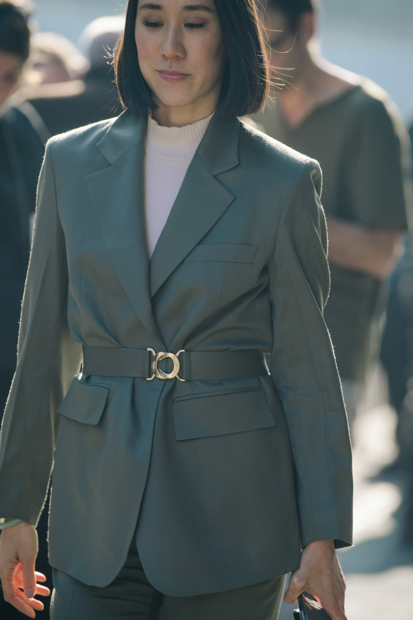 Woman wearing grey jacket