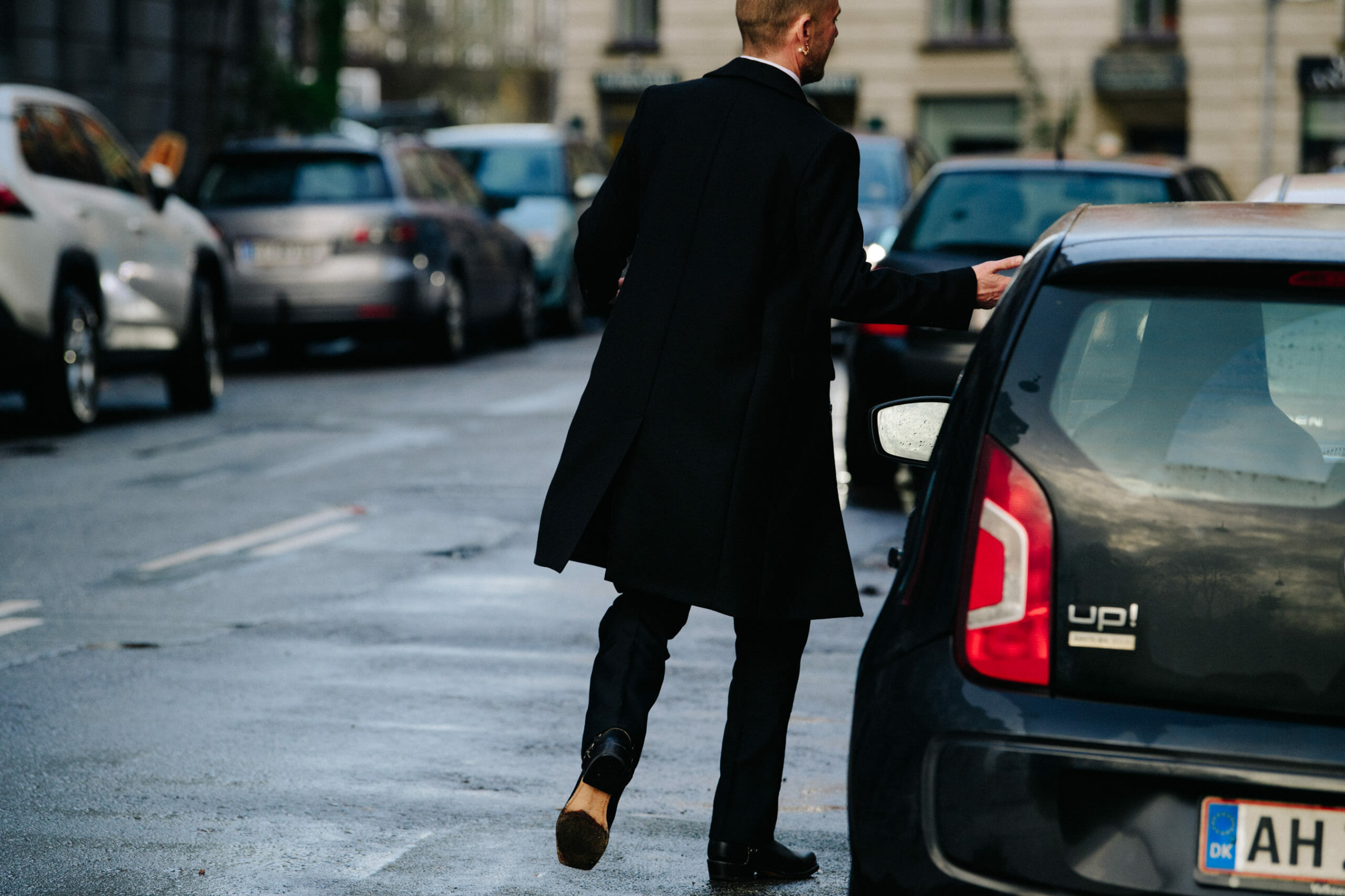 Man wearing black coat