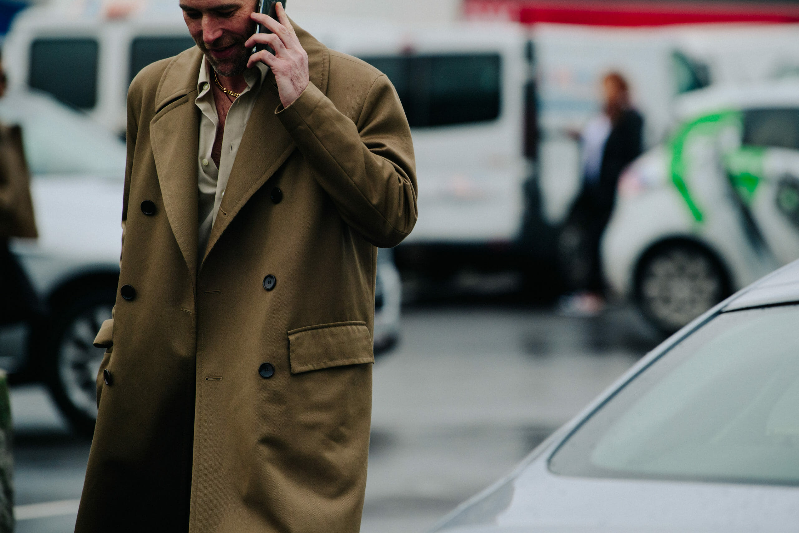 Man wearing tan coat