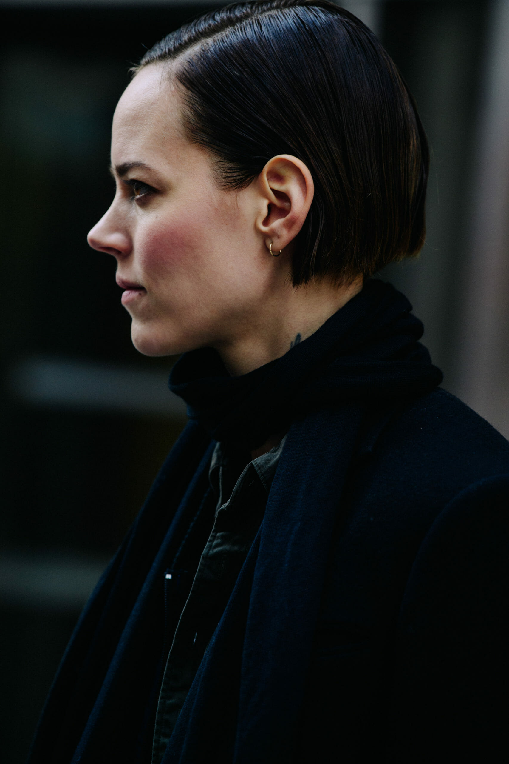 Woman wearing black scarf