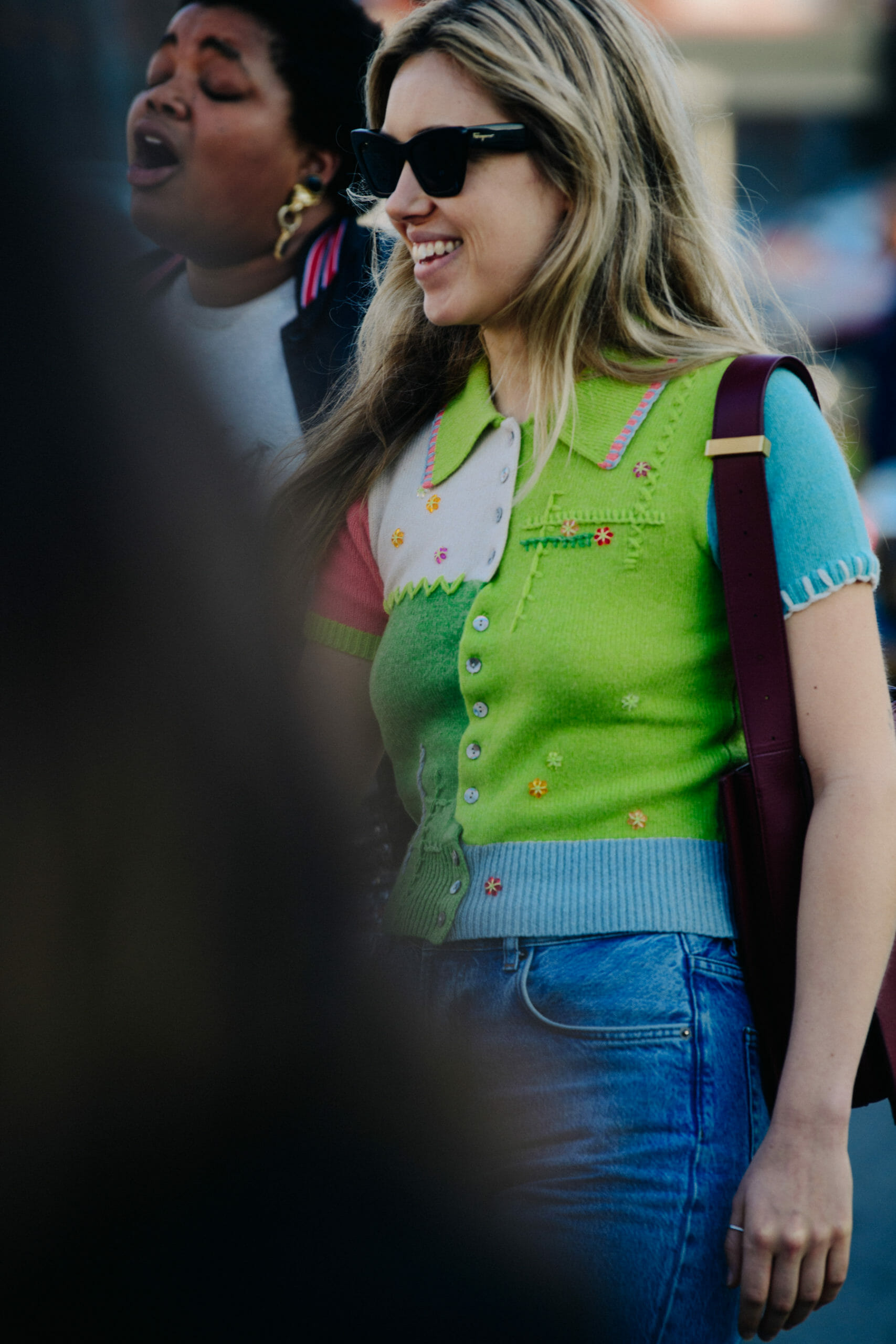 Woman wearing patchwork shirt