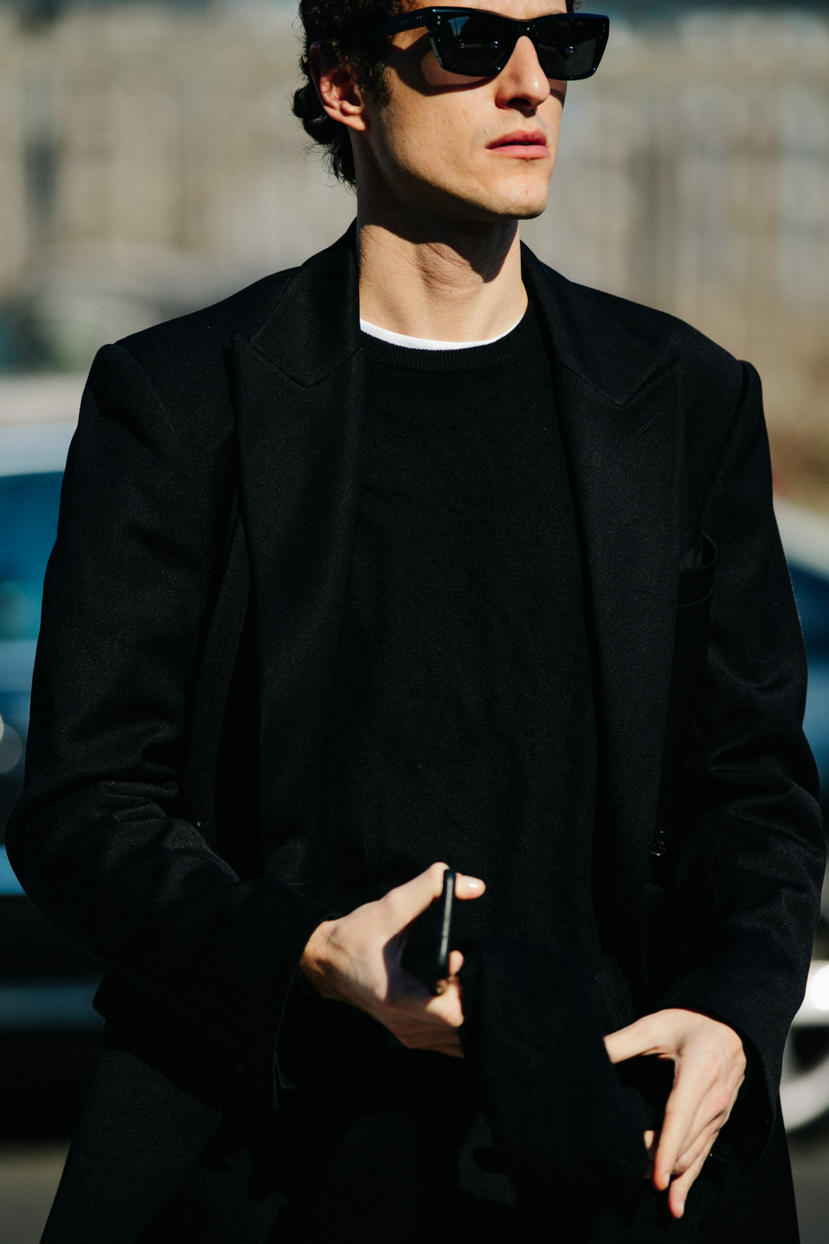 Man wearing dark outfit
