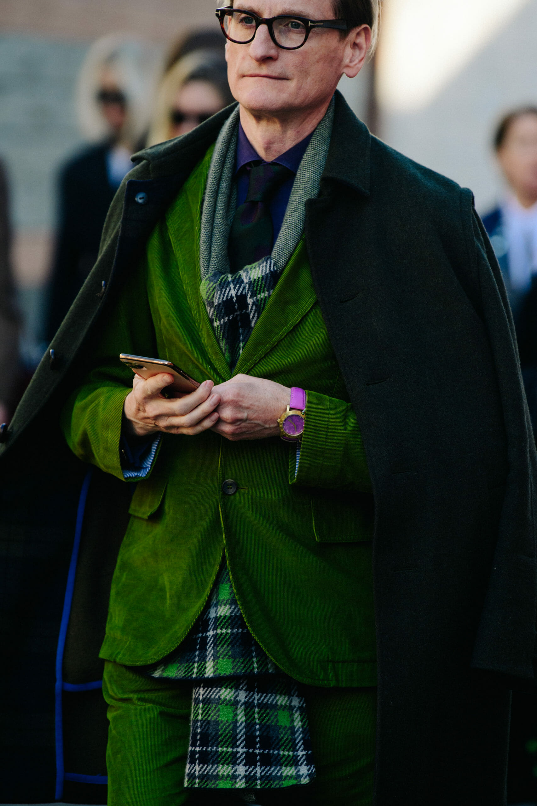 Man wearing green suit