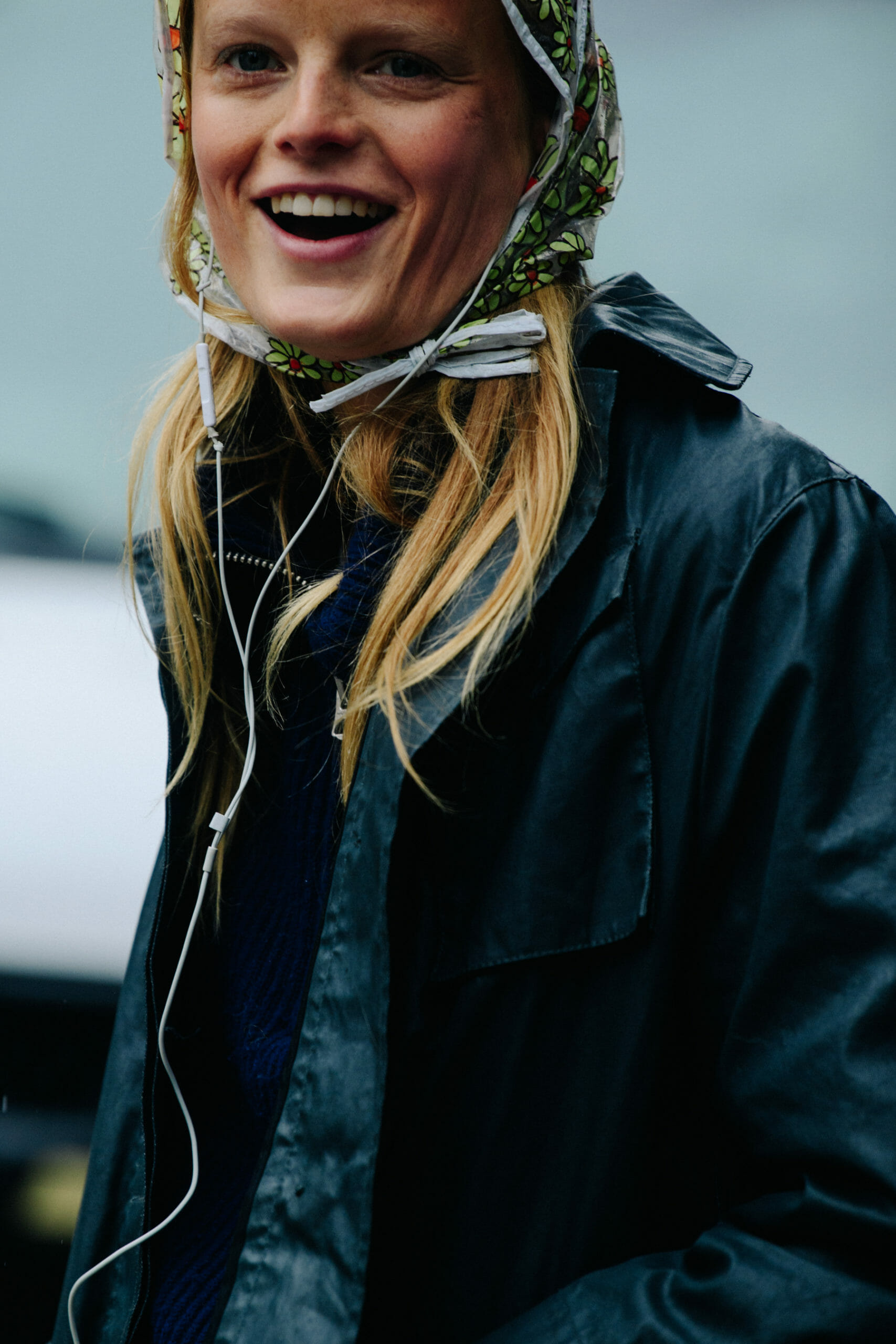 Model wearing plastic hair cover