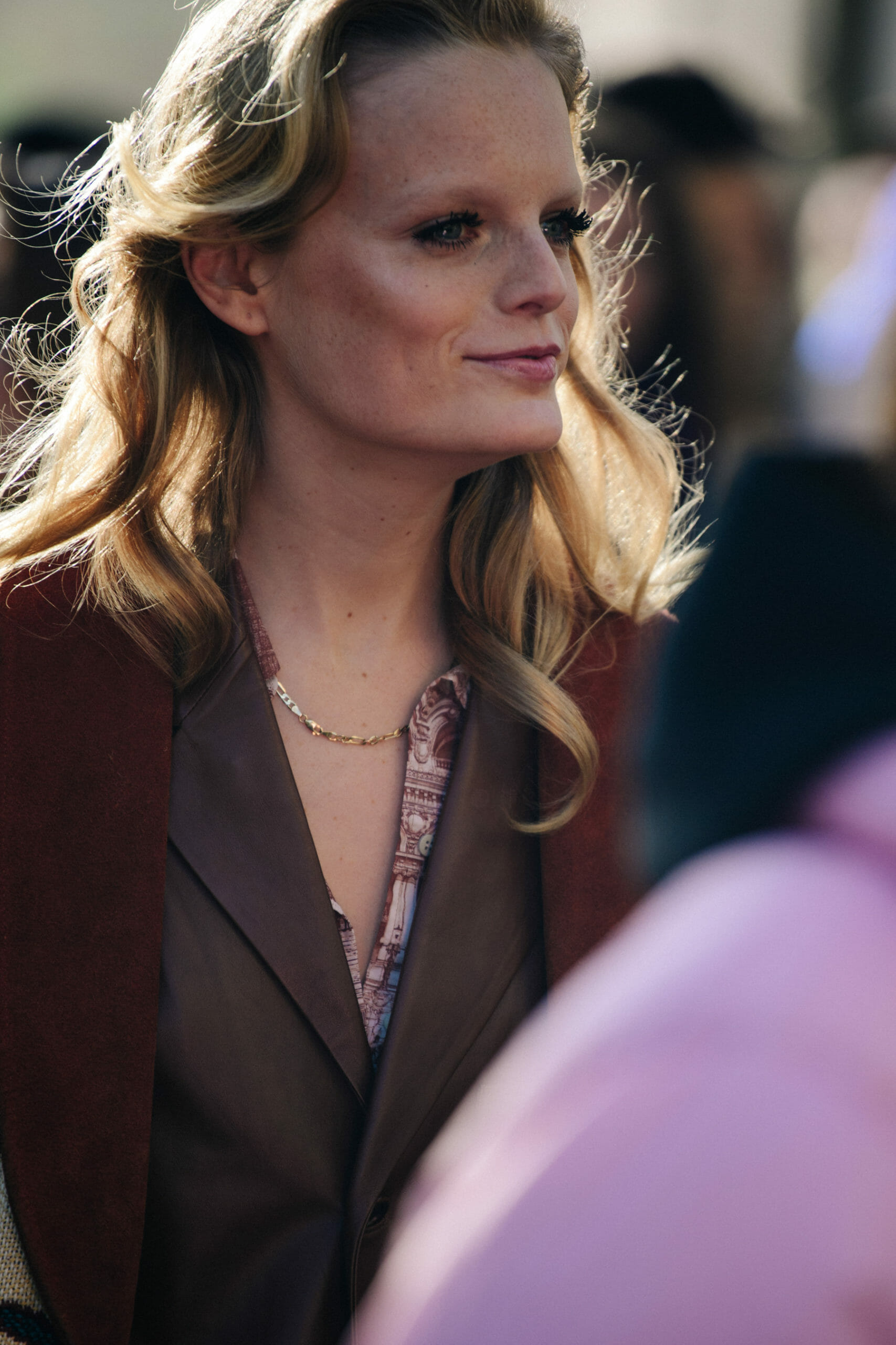 Model wearing brown jacket