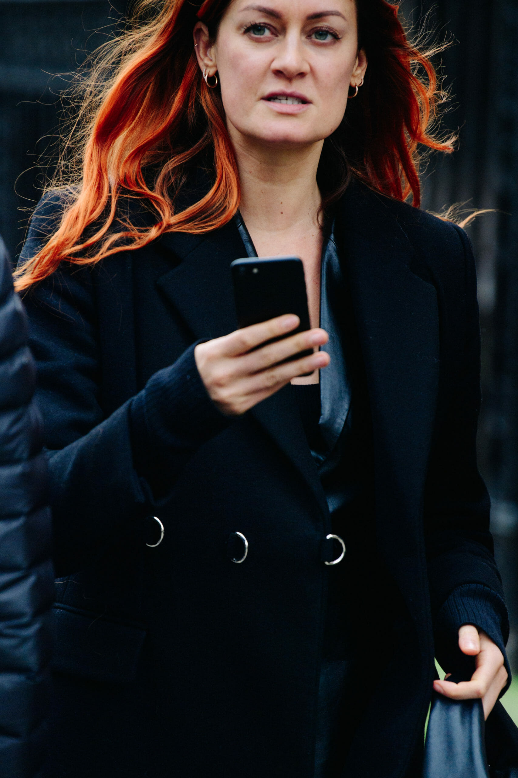 Woman wearing black coat