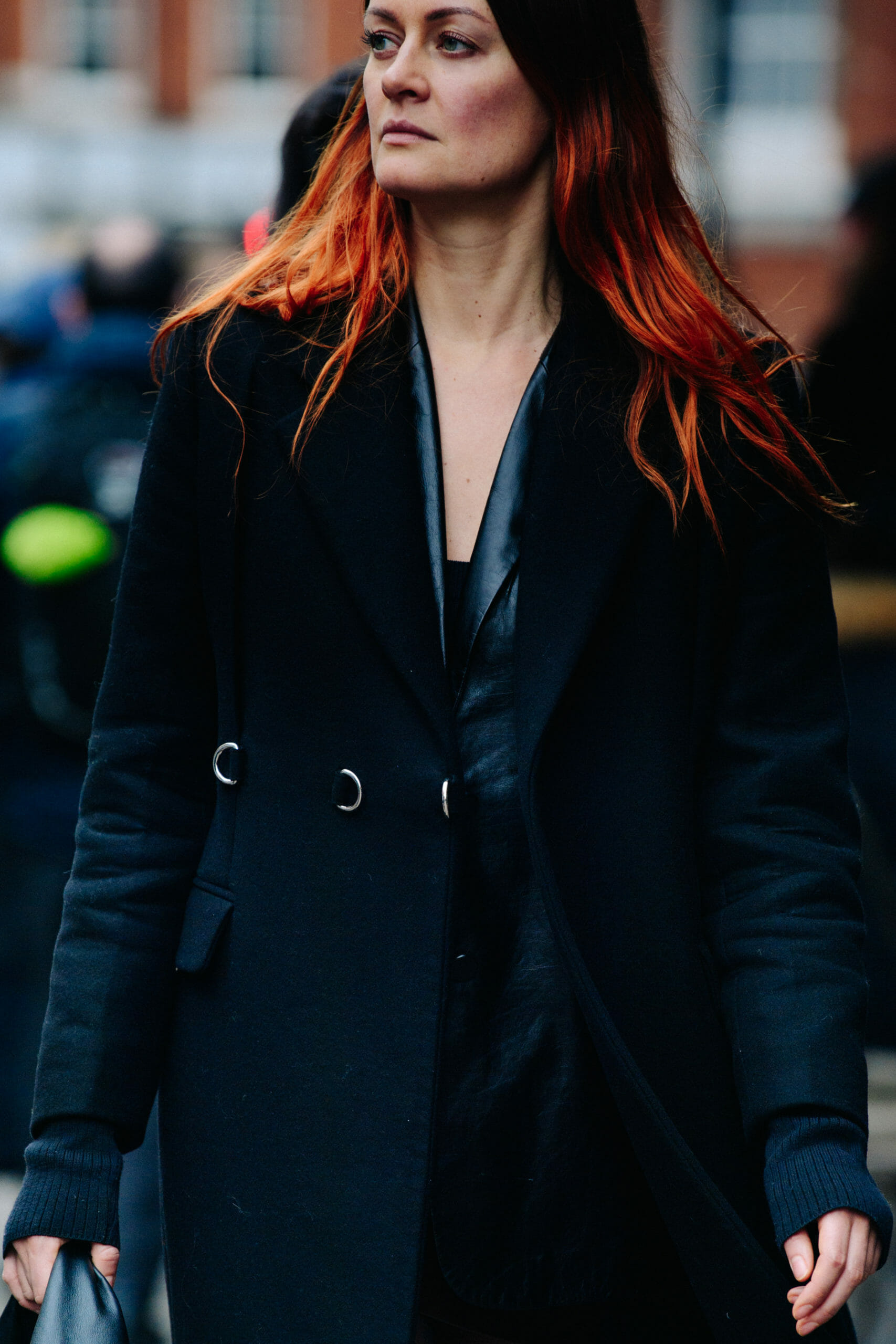 Woman wearing black coat