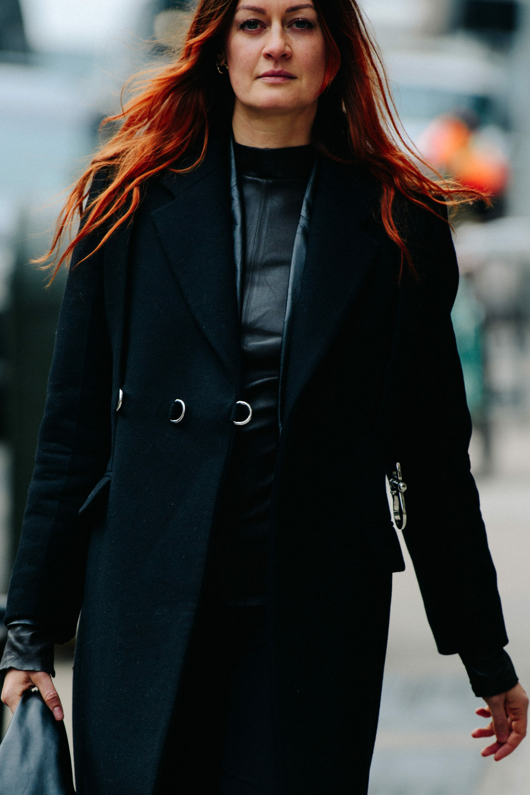 Woman wearing black coat