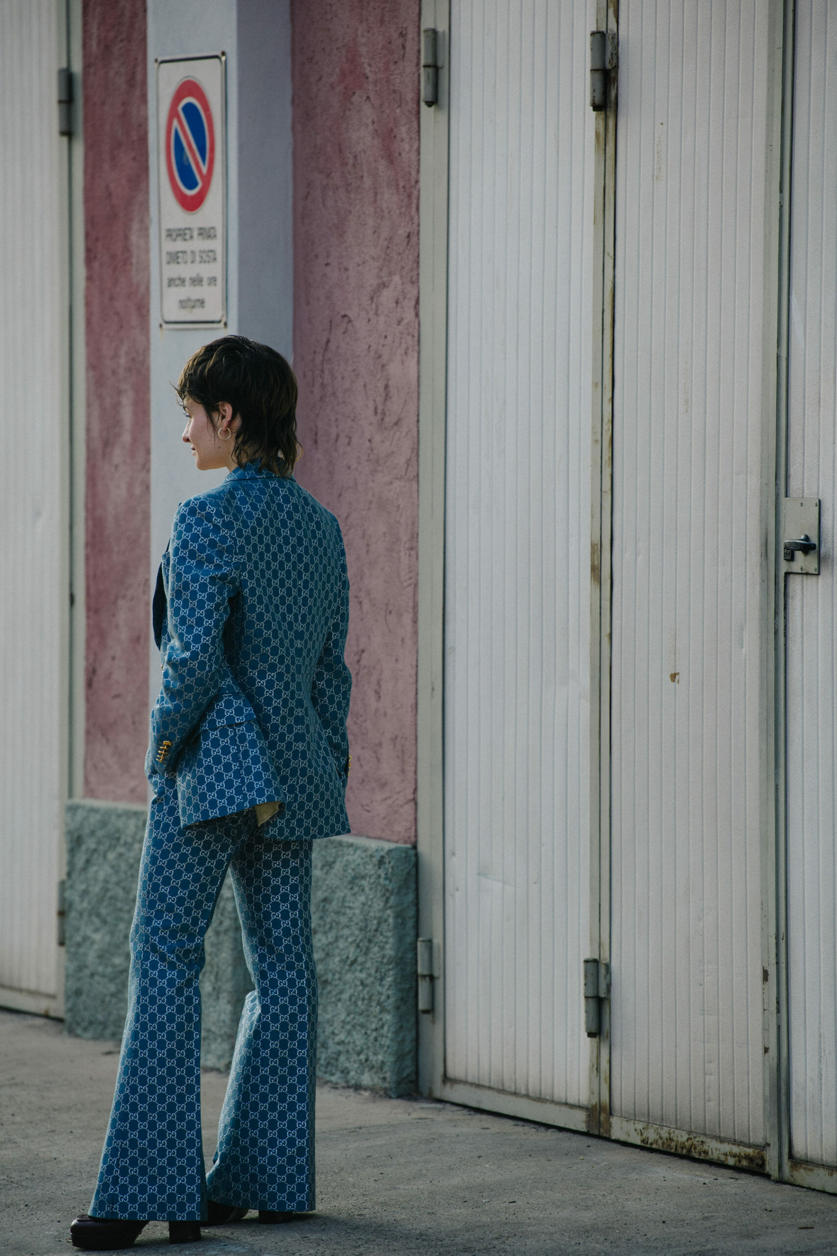 Woman wearing Gucci suit