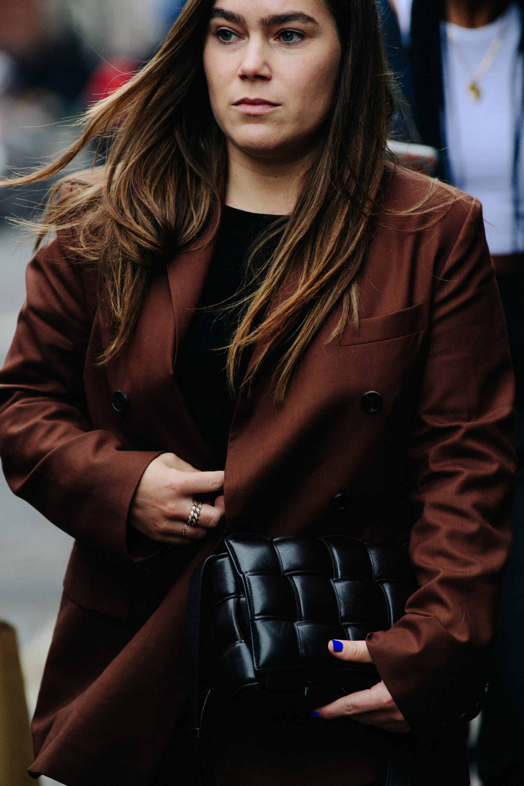 Woman wearing brown jacket