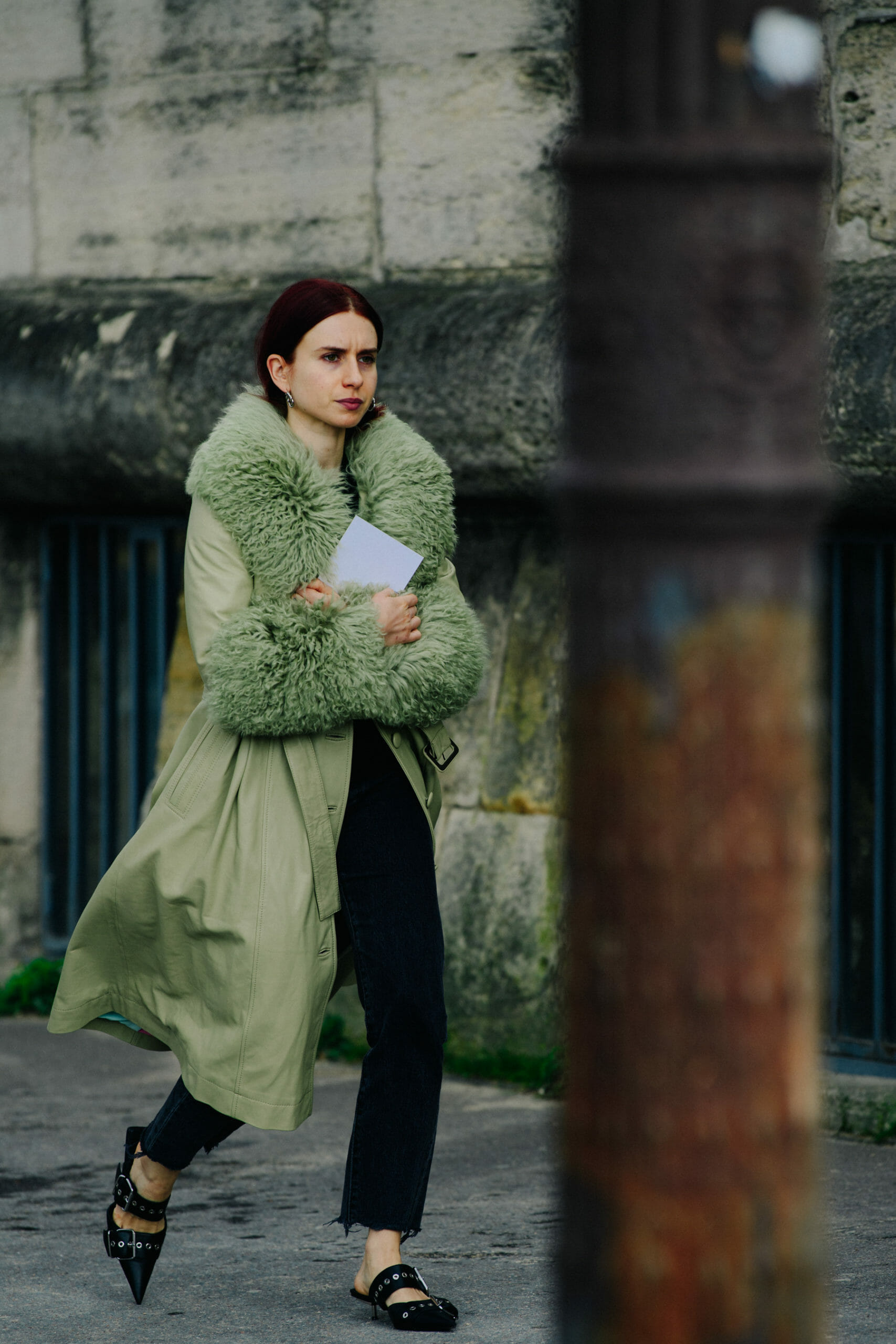 Woman wearing green coat