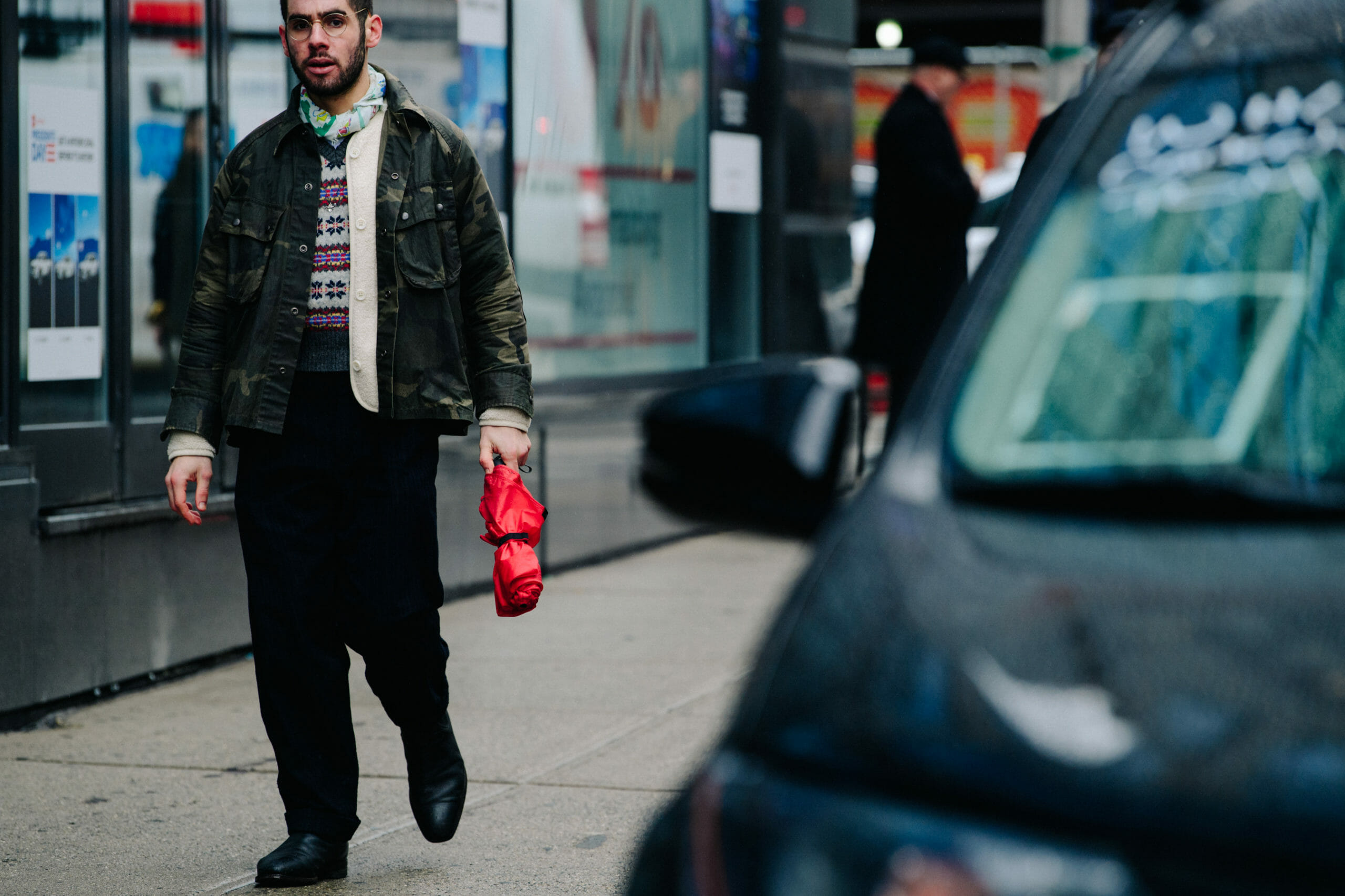 Man wearing camo coat
