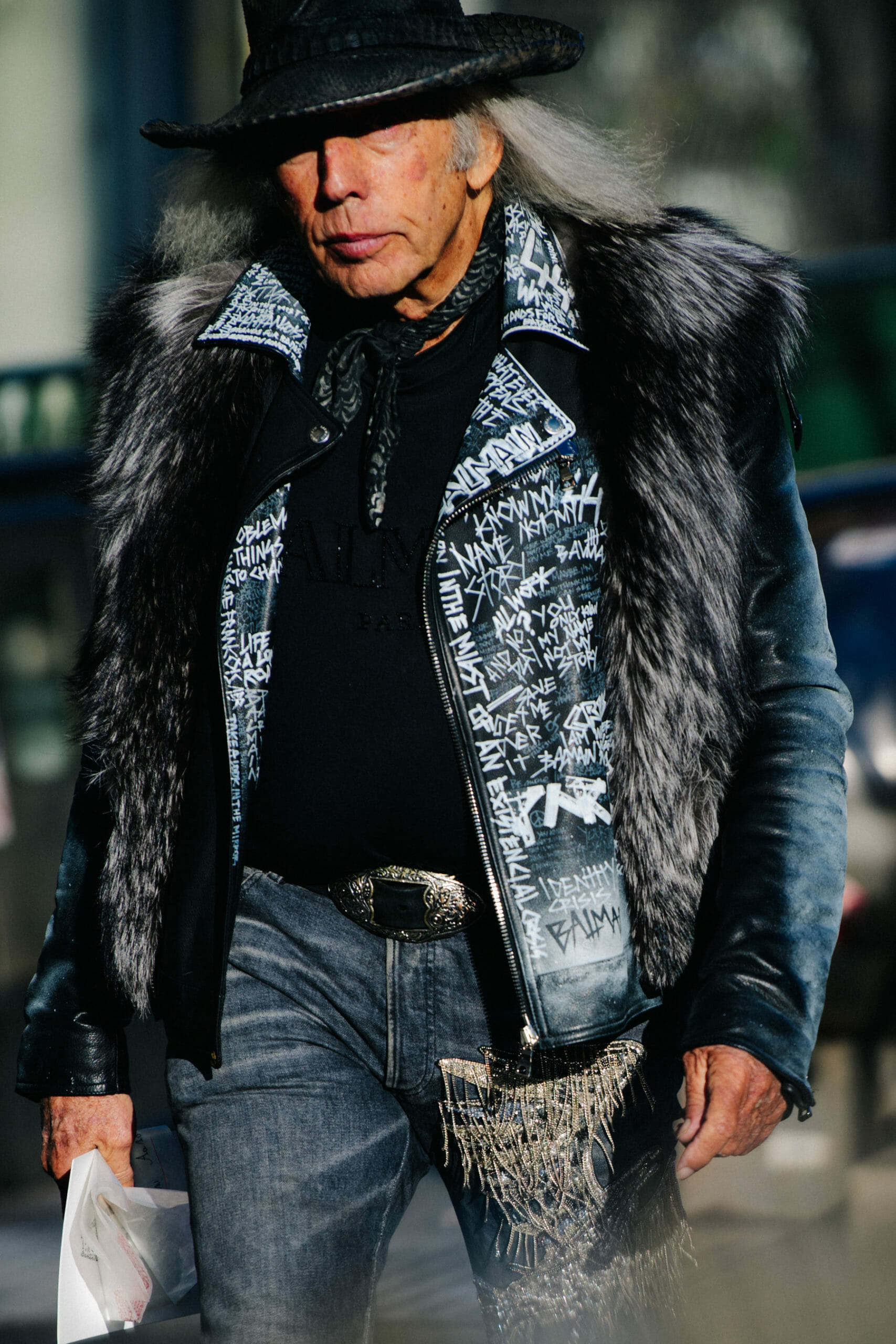 Man wearing leather cowboy hat
