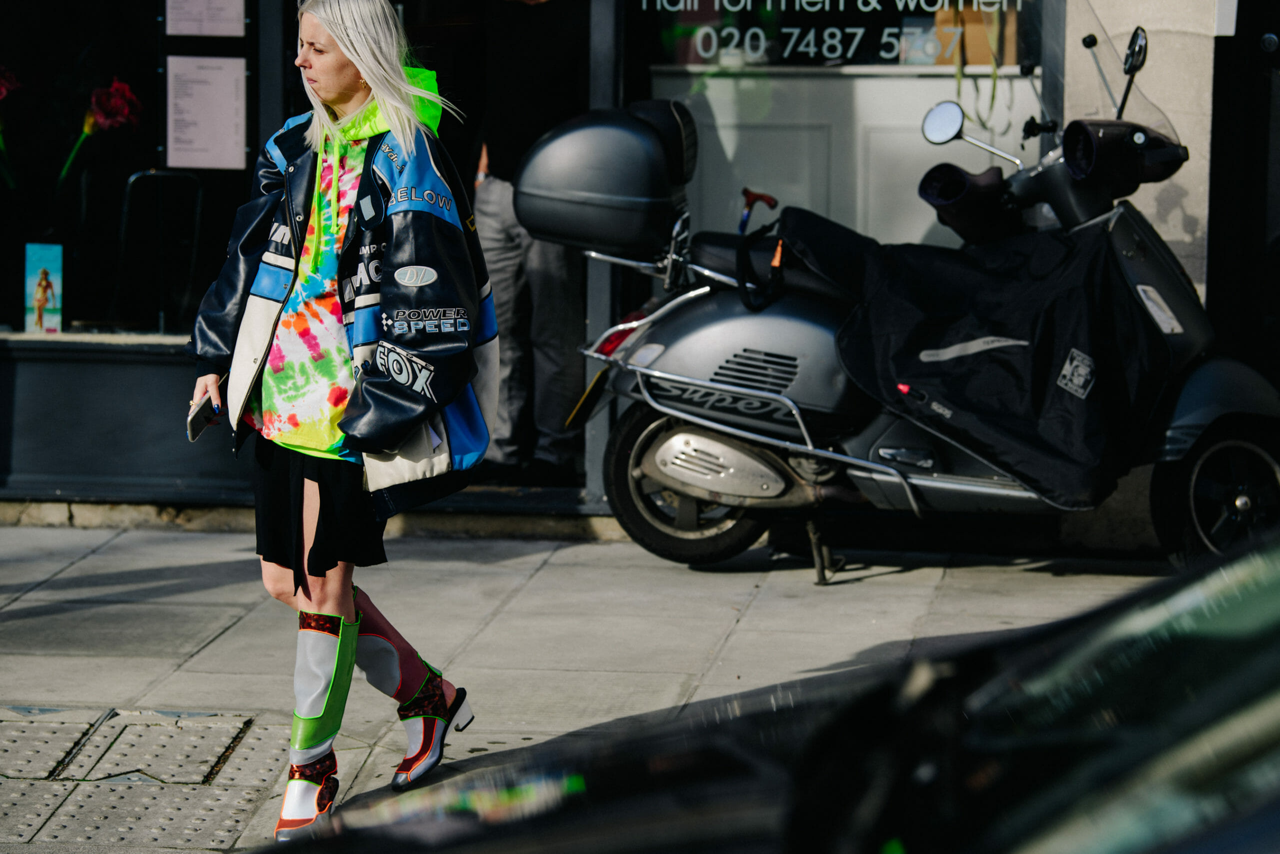 Woman wearing colourful boots