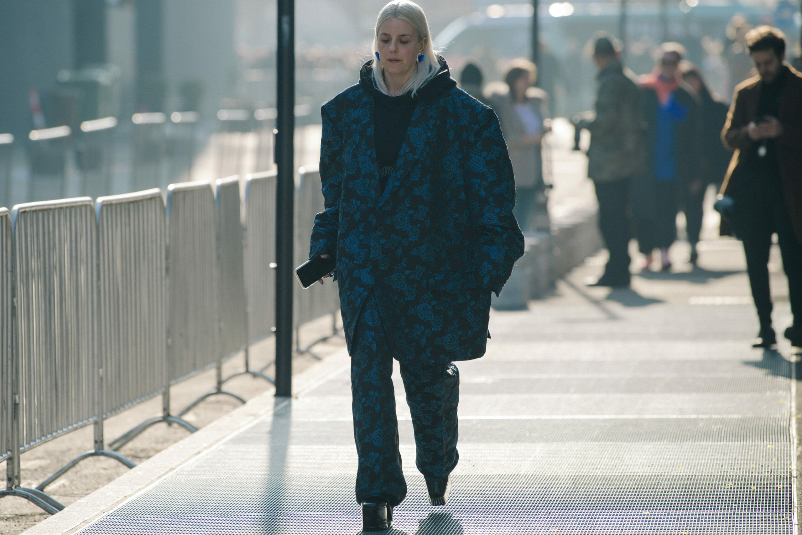 Woman wearing blue floral suit