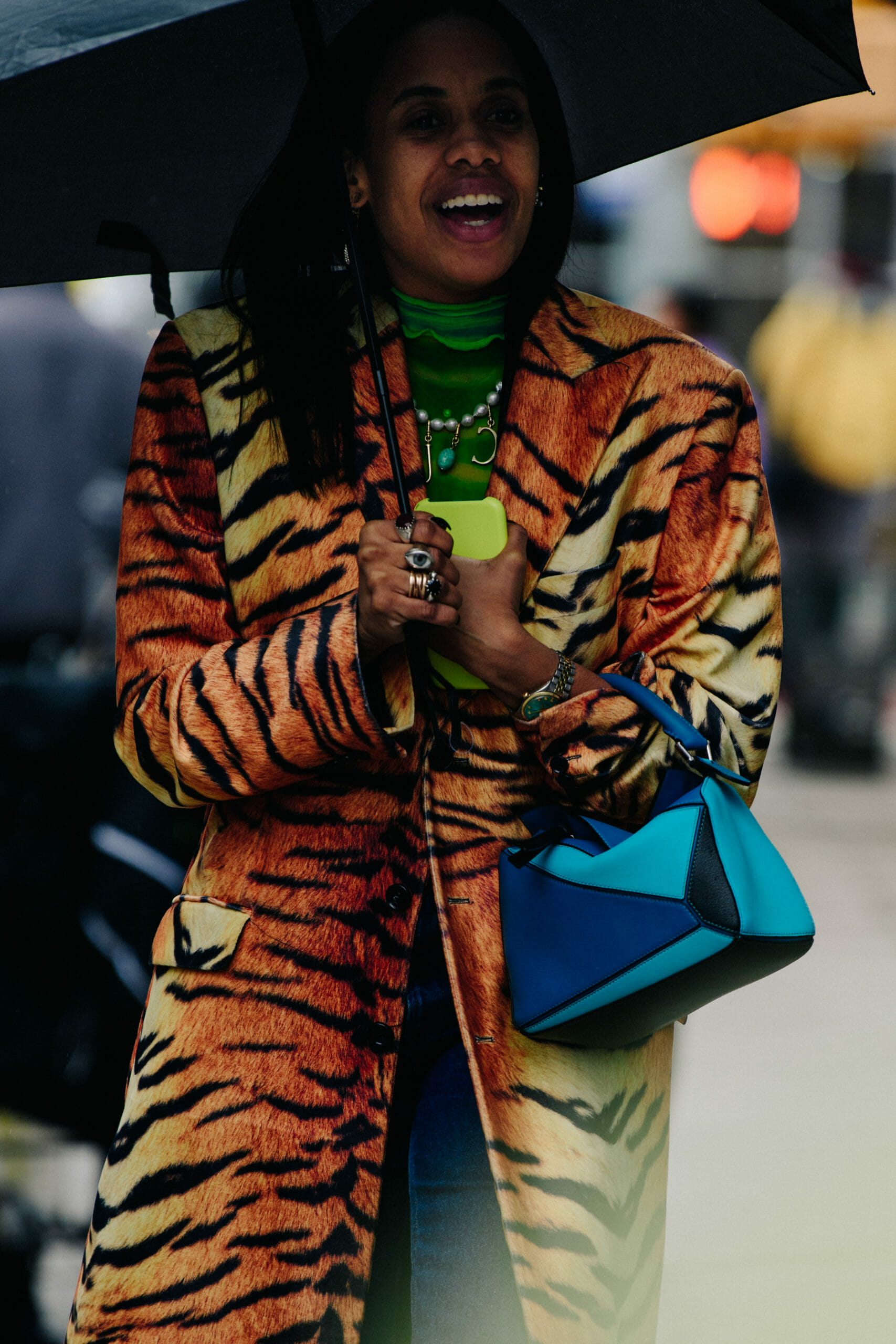 Woman wearing striped coat