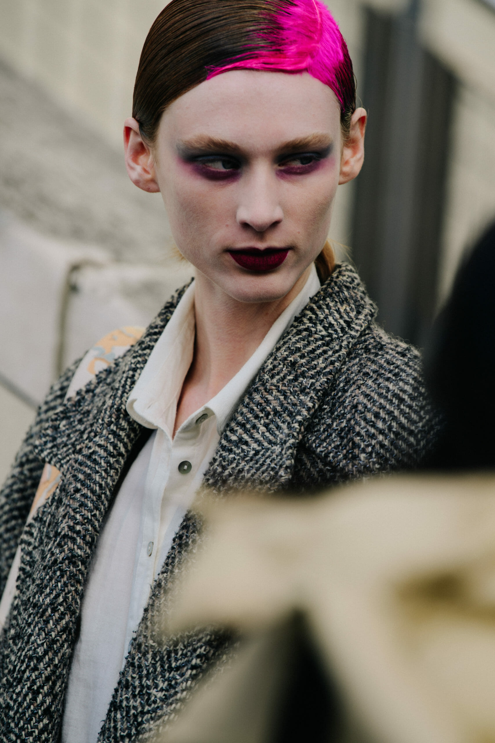 Model with feather in hair