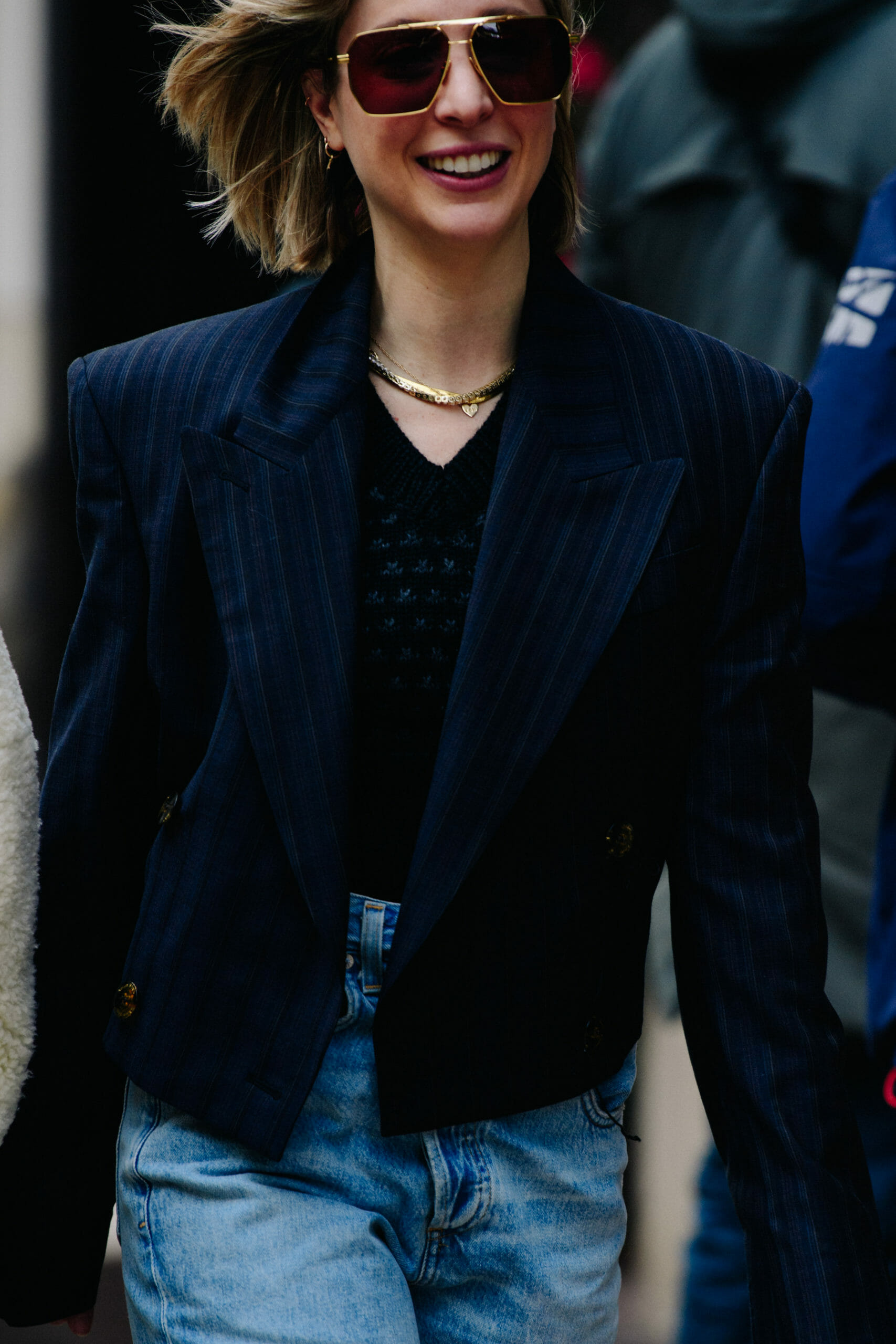 Woman wearing striped jacket