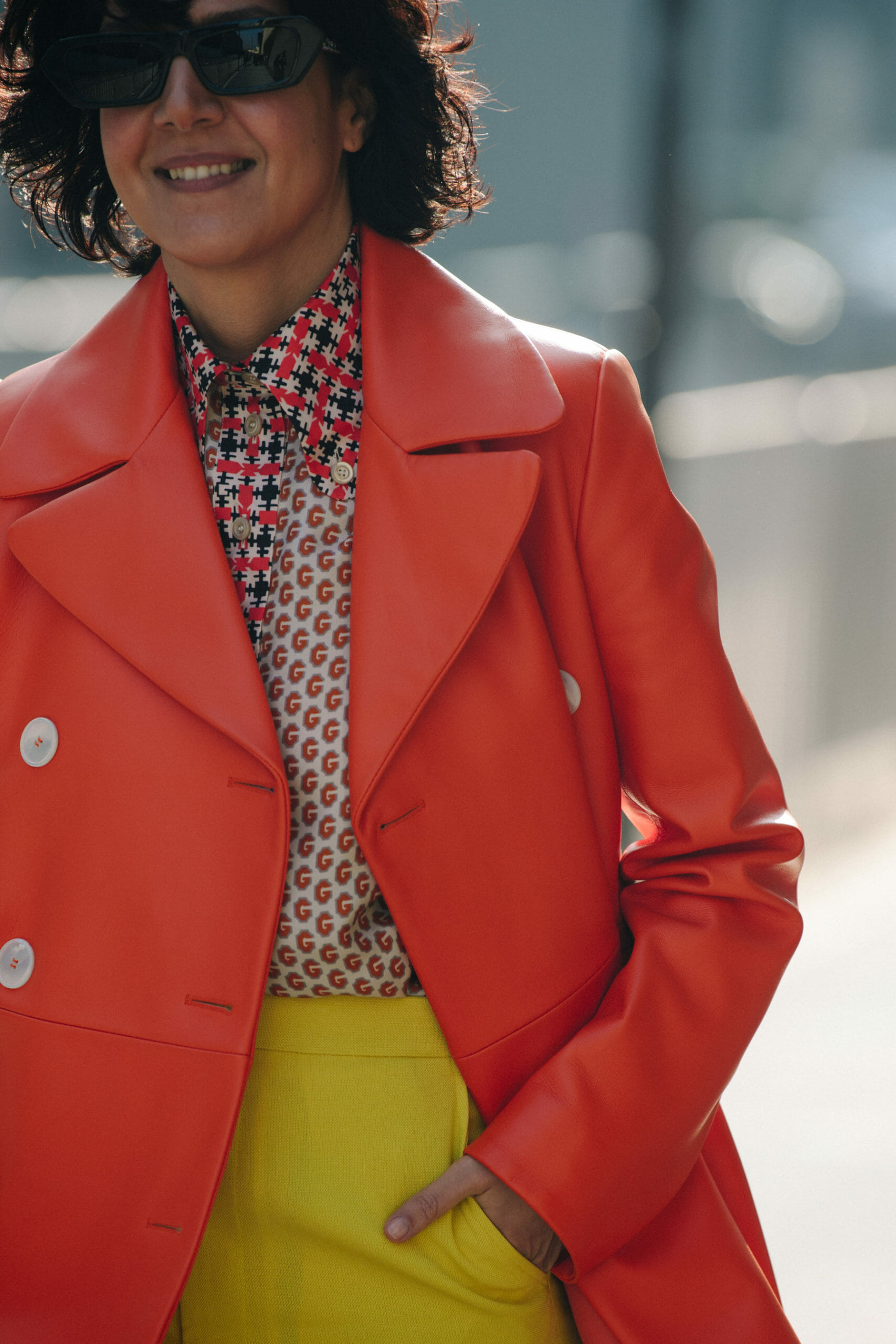 Woman wearing orange leather coat
