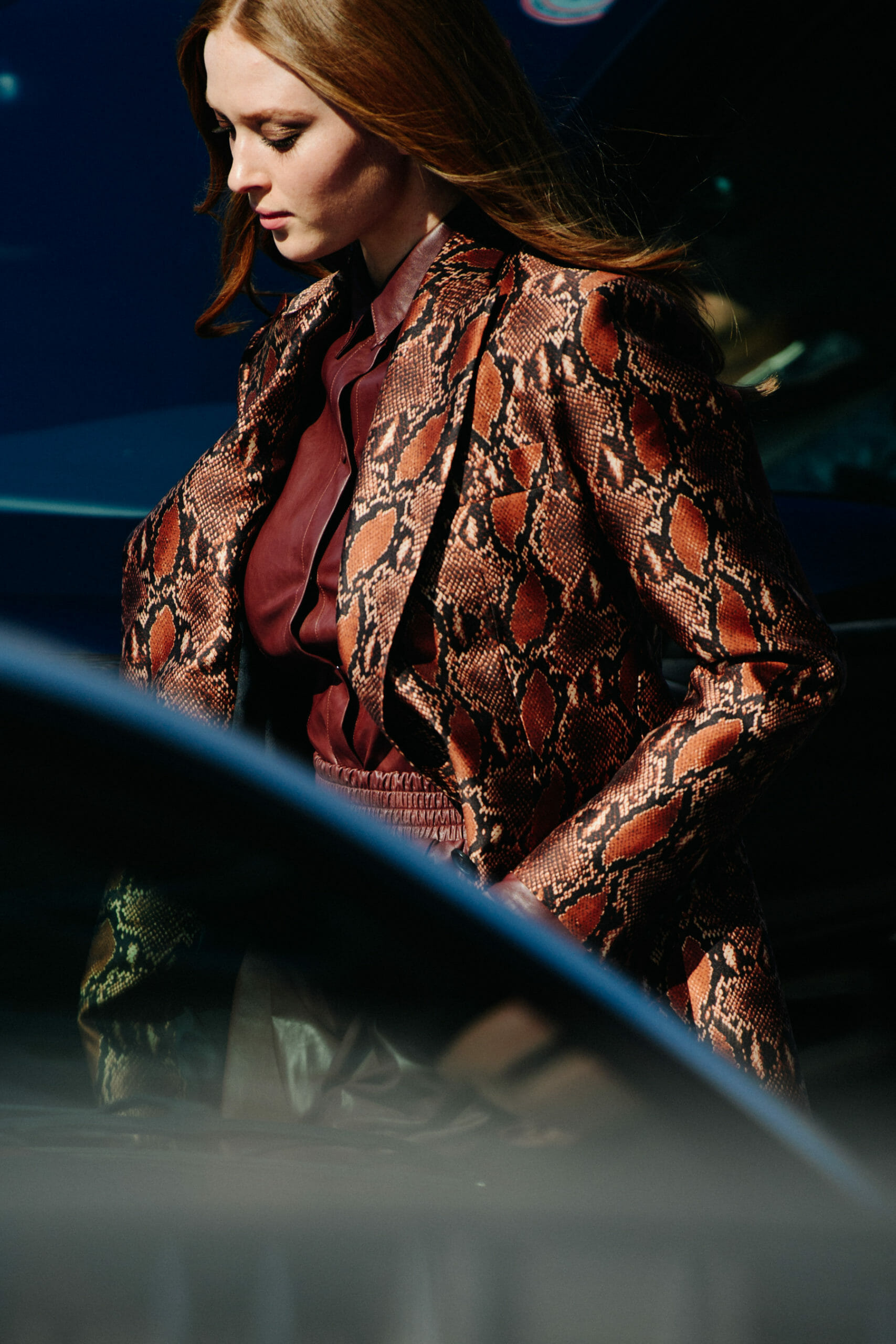Woman wearing snakeskin suit