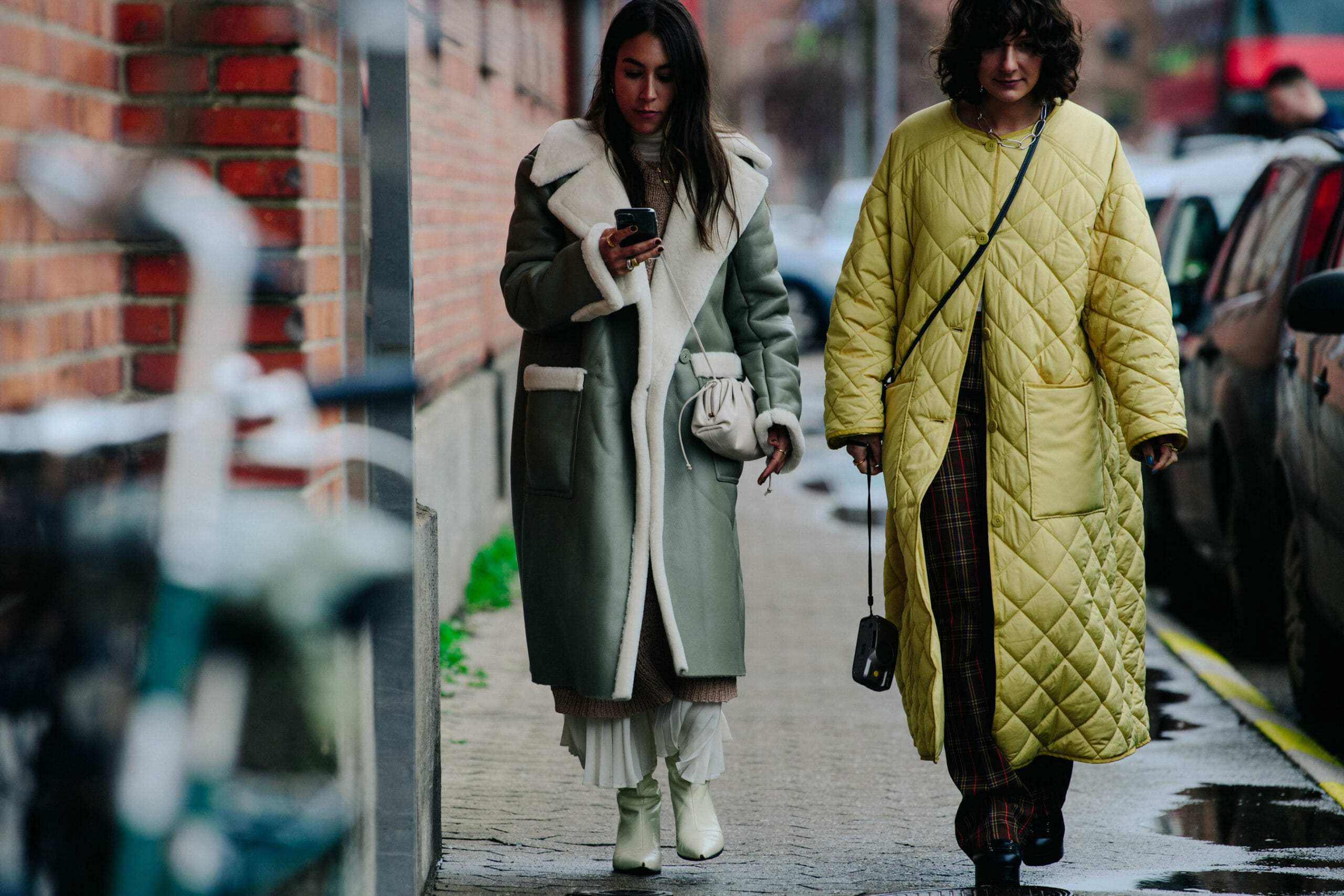 Two bloggers wearing winter coats