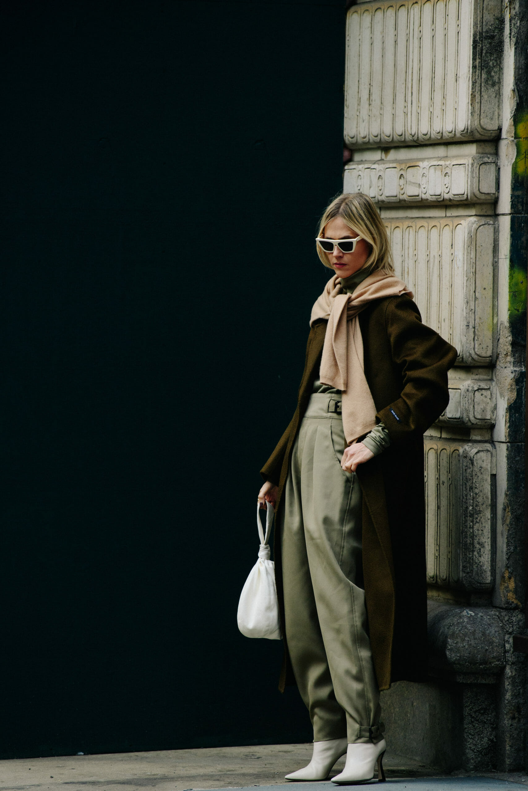 Woman wearing green pants