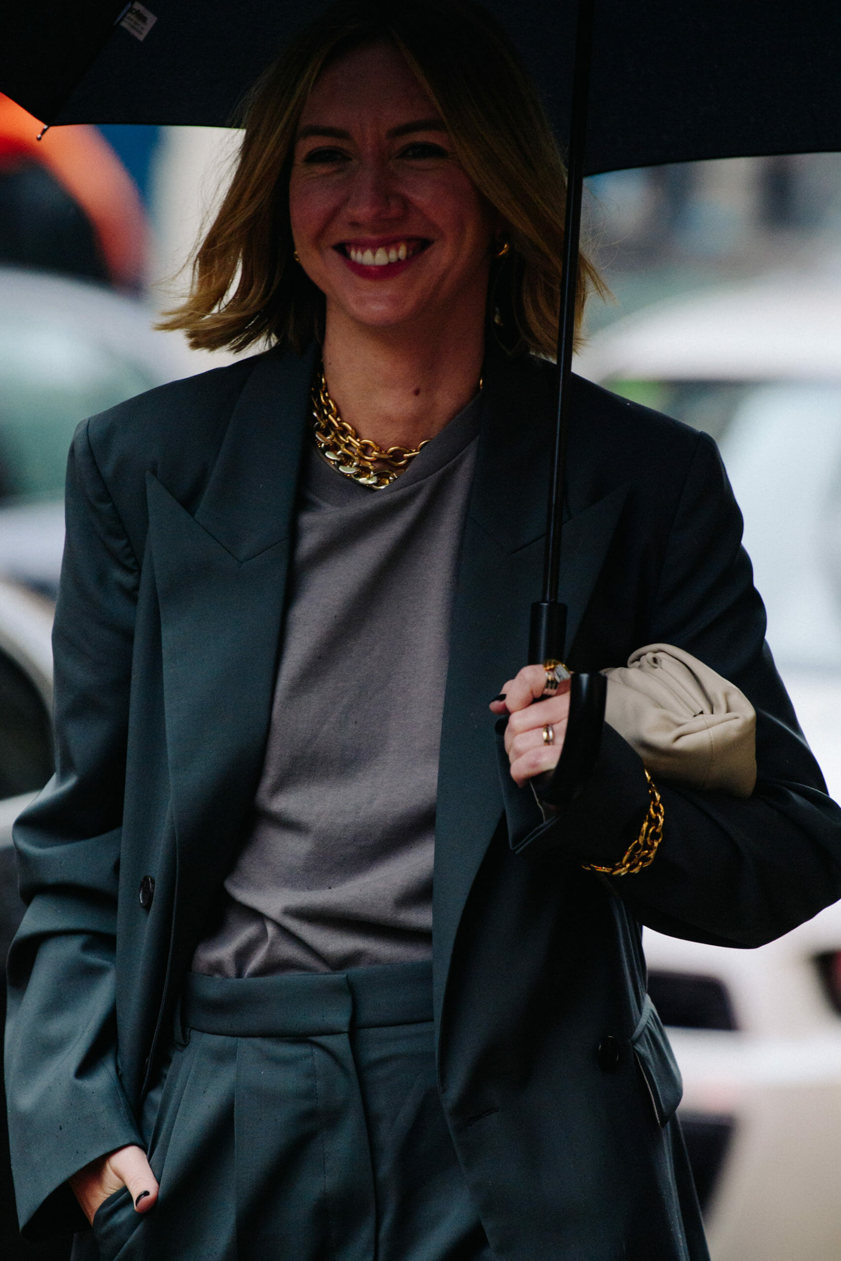 Woman carrying umbrella