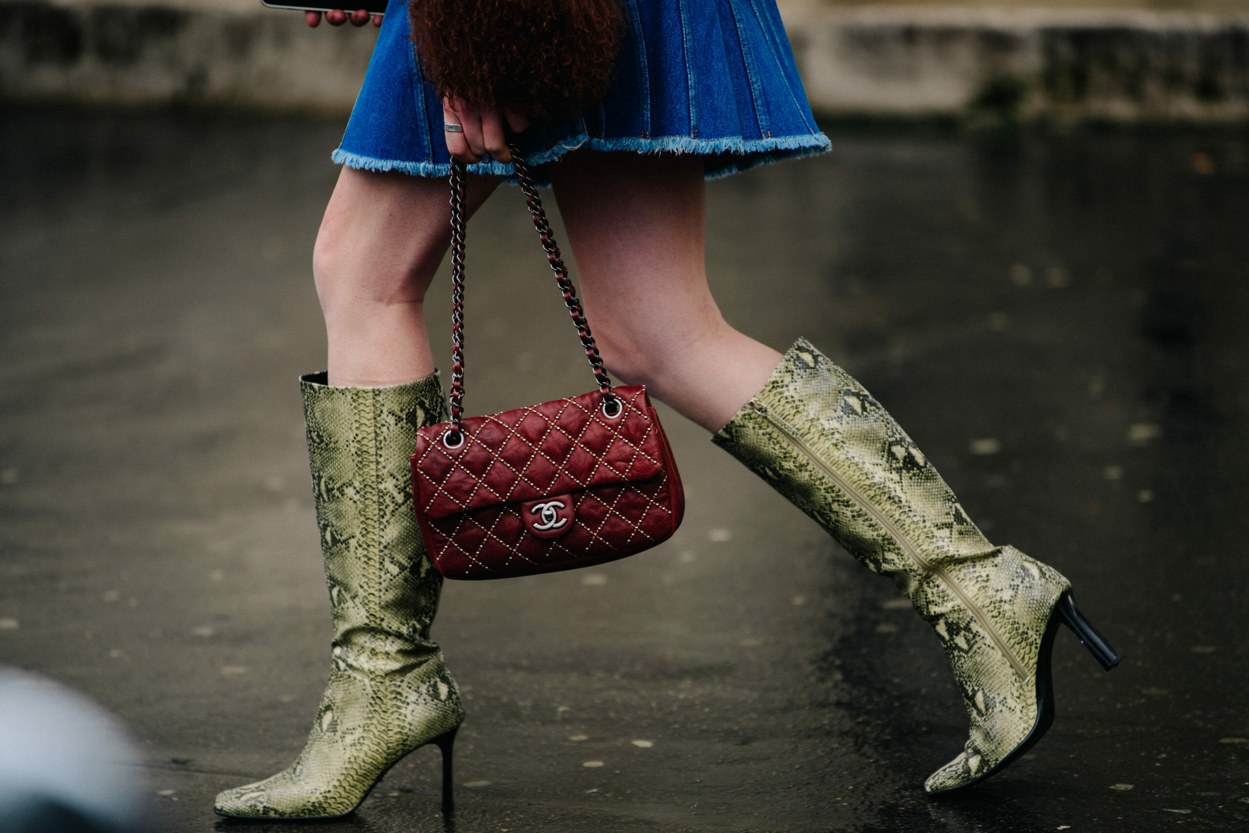 Woman carrying Chanel bag