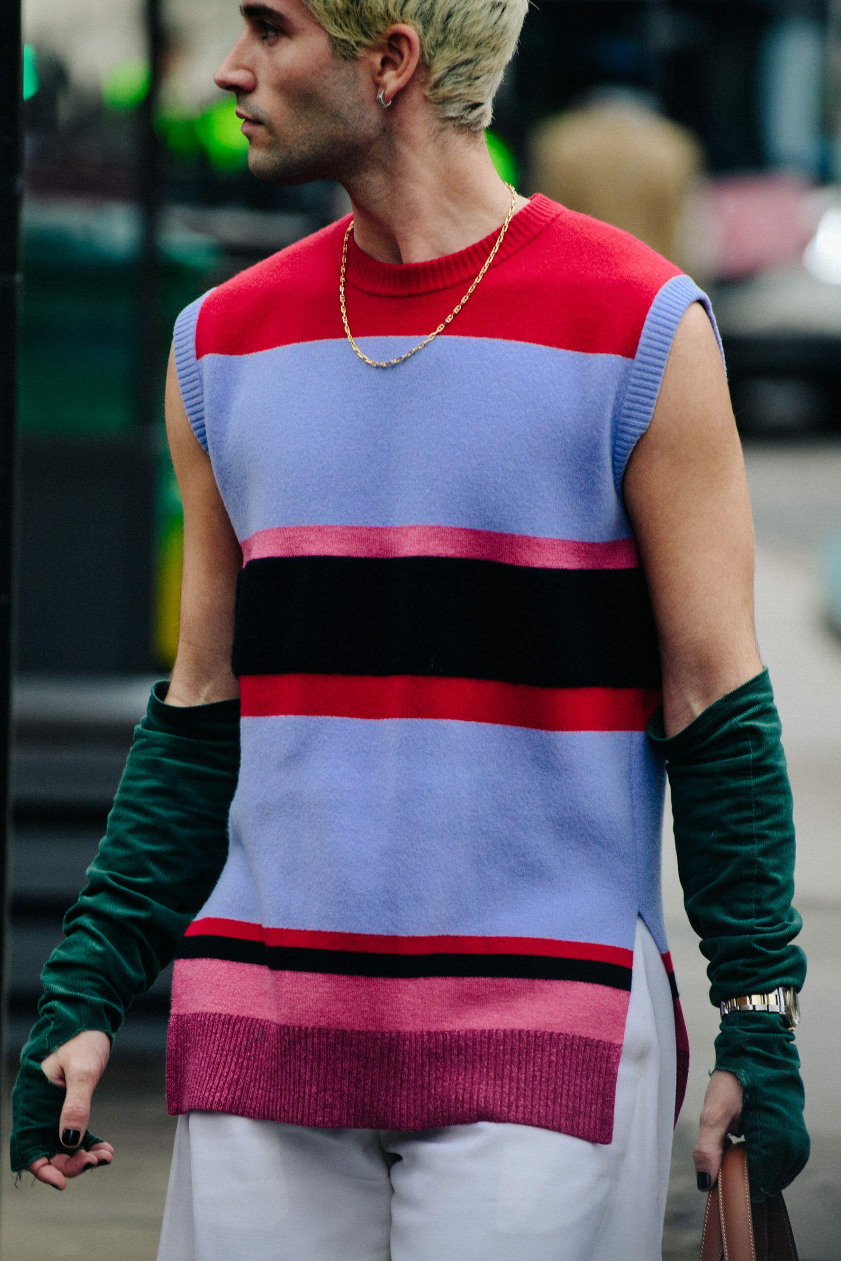Man wearing striped vest