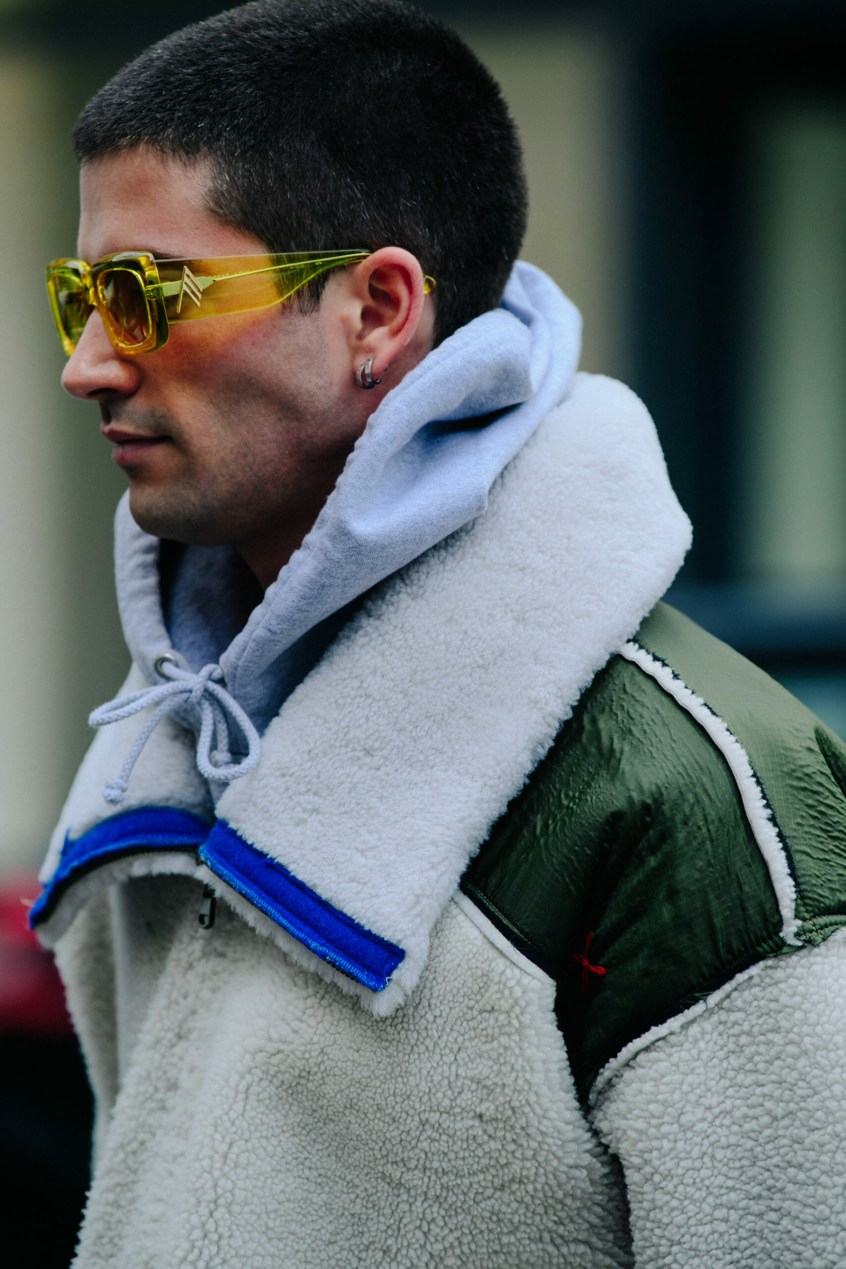 Man wearing yellow glasses