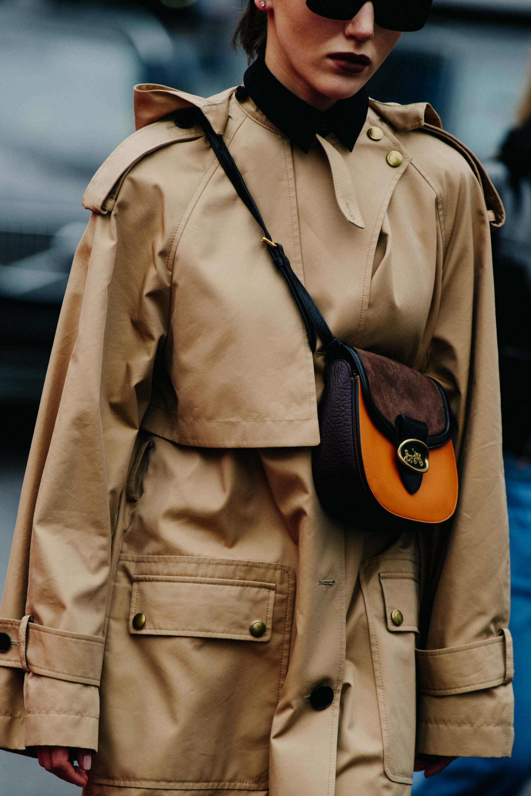 Woman wearing tan coat
