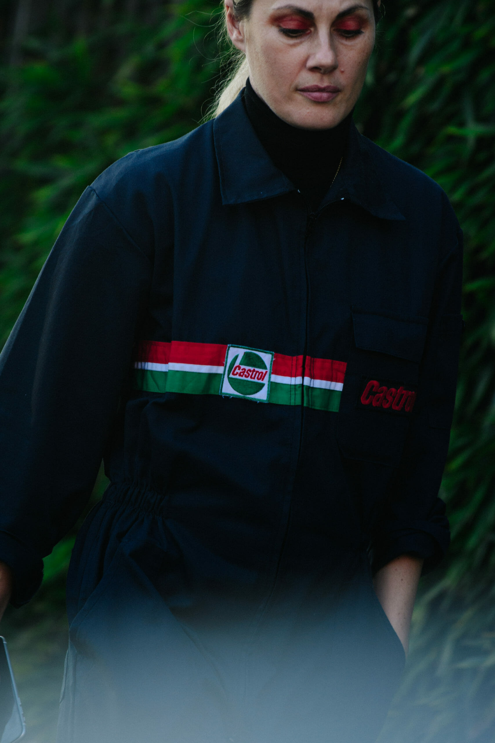 Woman wearing mechanics jacket