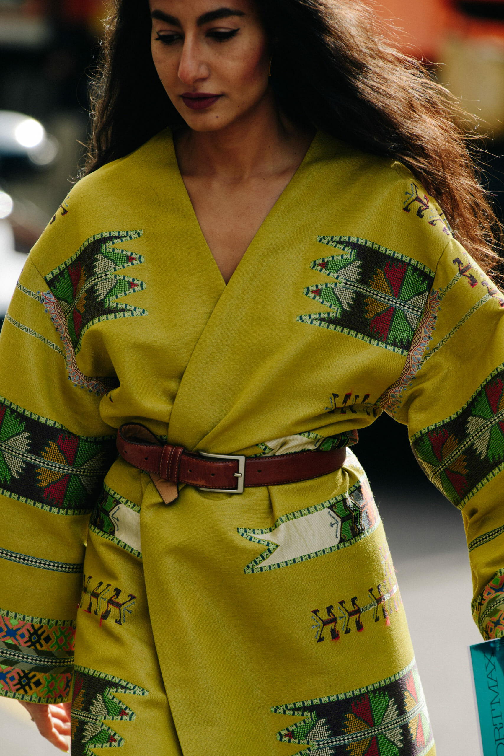 Woman wearing yellow jacket