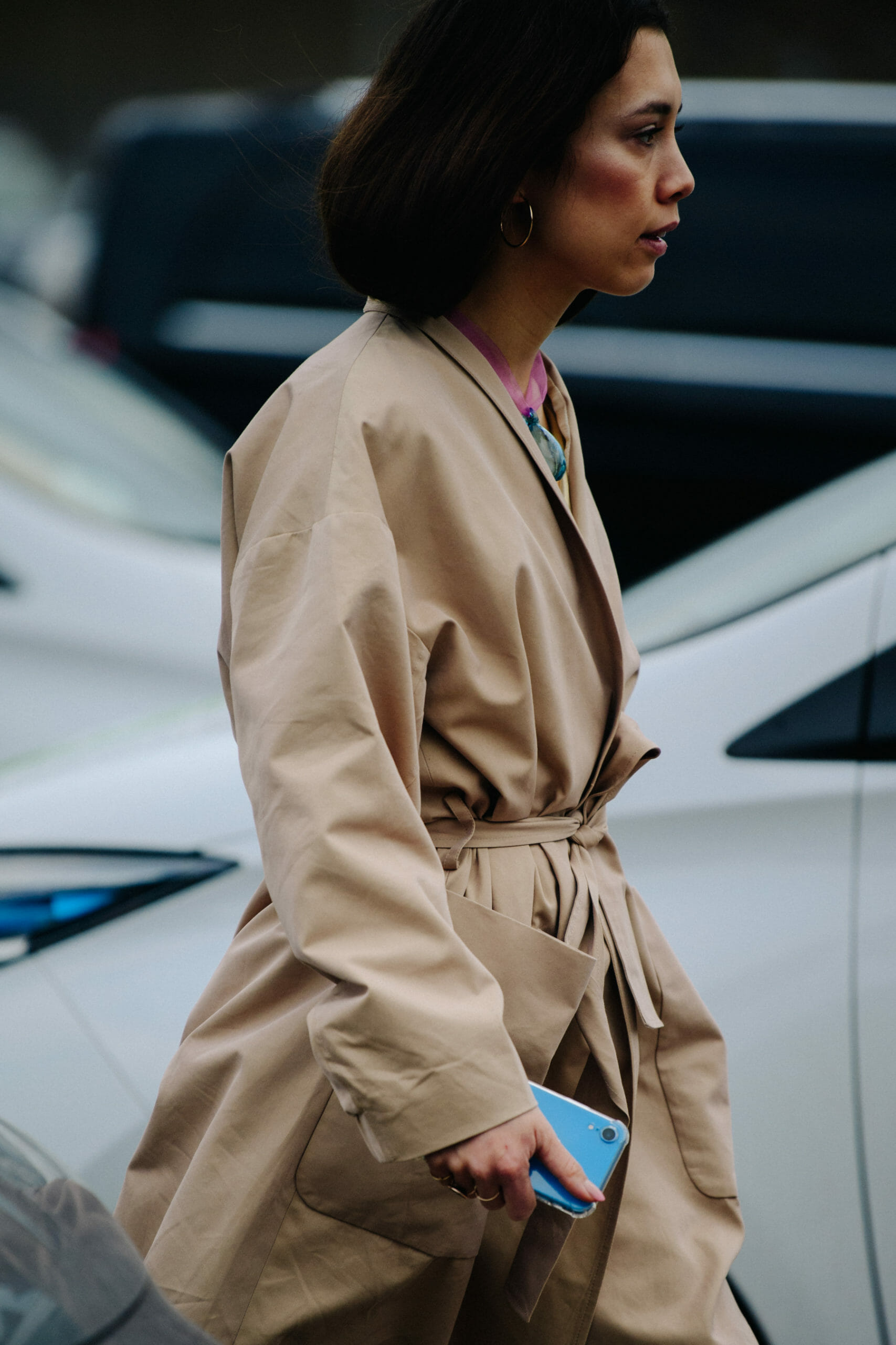 Woman wearing tan coat