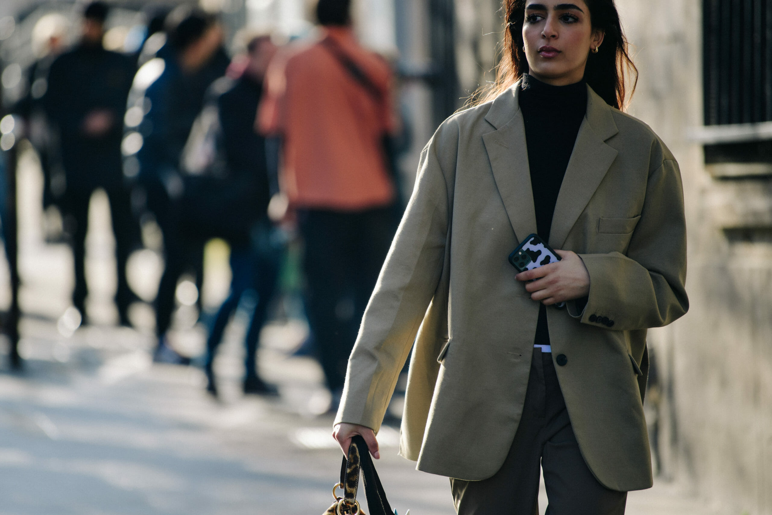 Woman wearing light green blazer