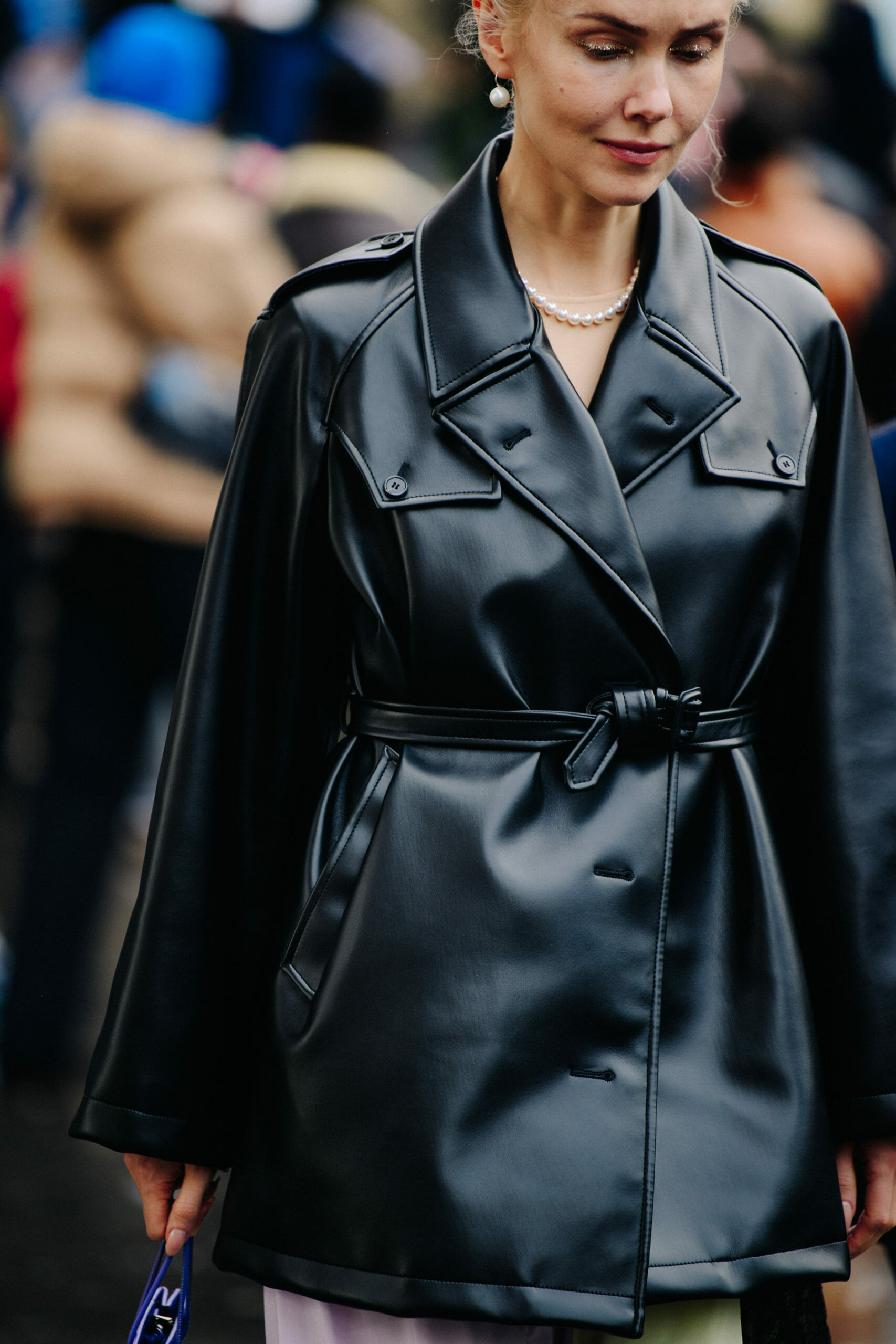 Woman wearing black leather coat