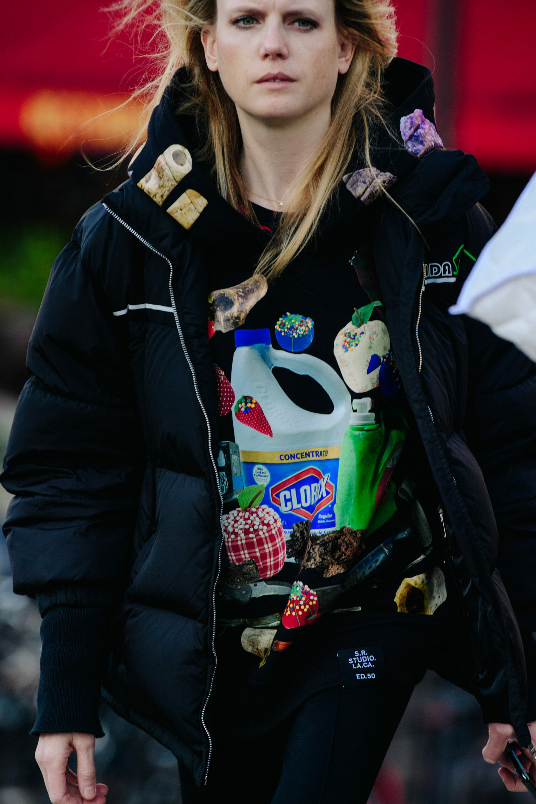 Woman wearing graphic hoodie