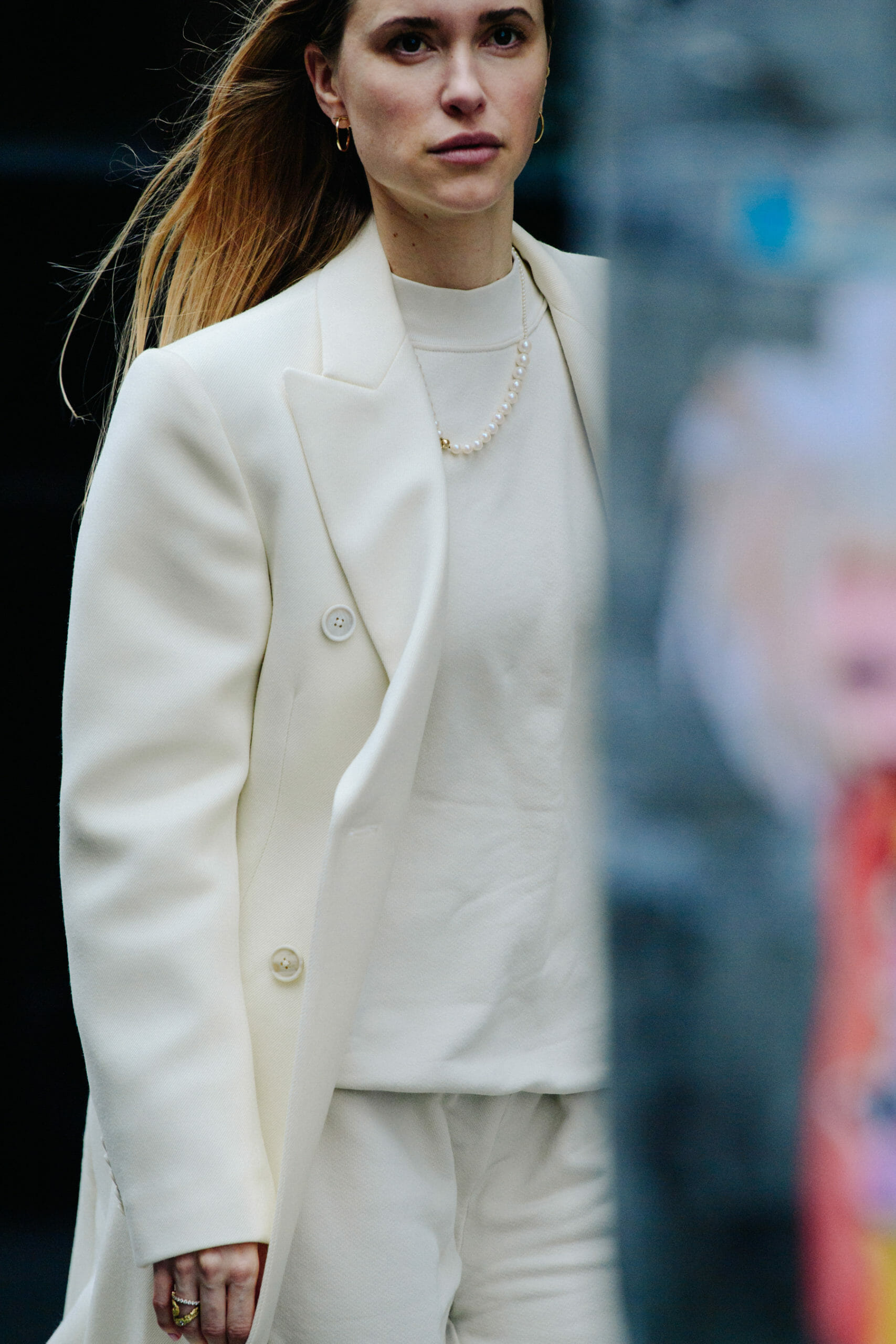 Woman wearing white coat