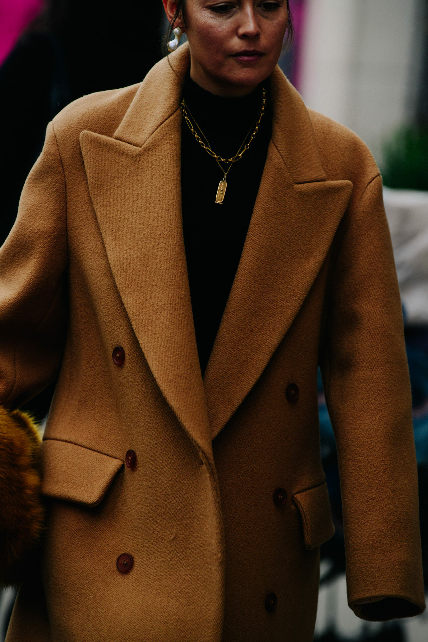 Woman wearing brown coat