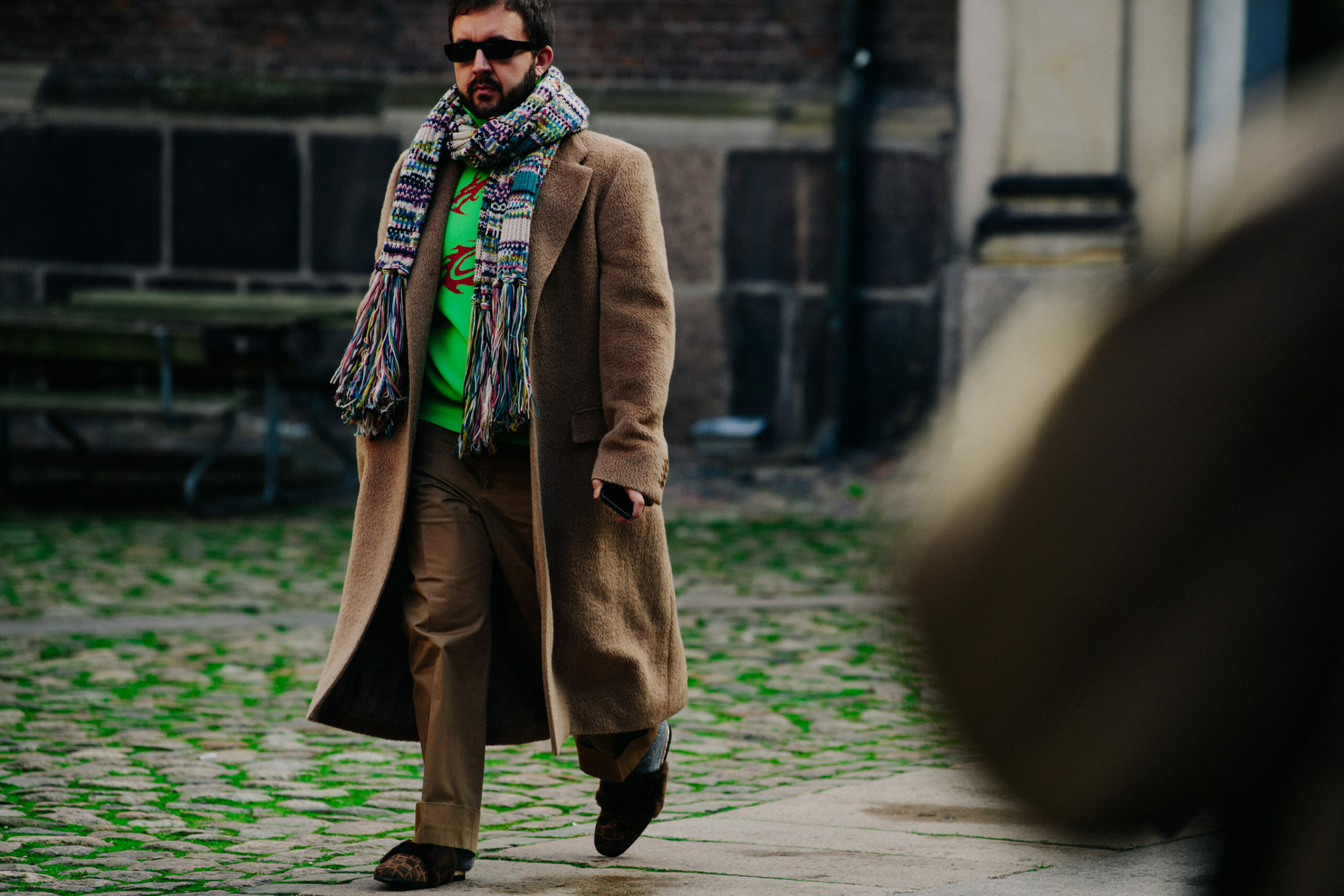 Man wearing tan outfit