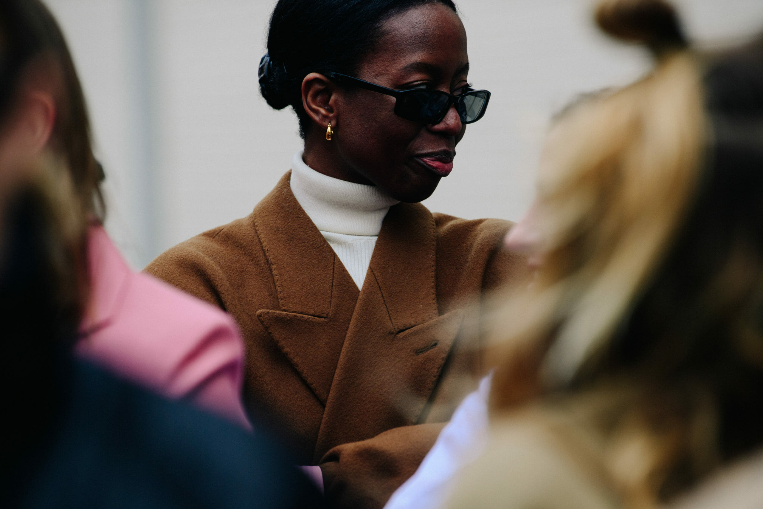 Woman wearing brown coat