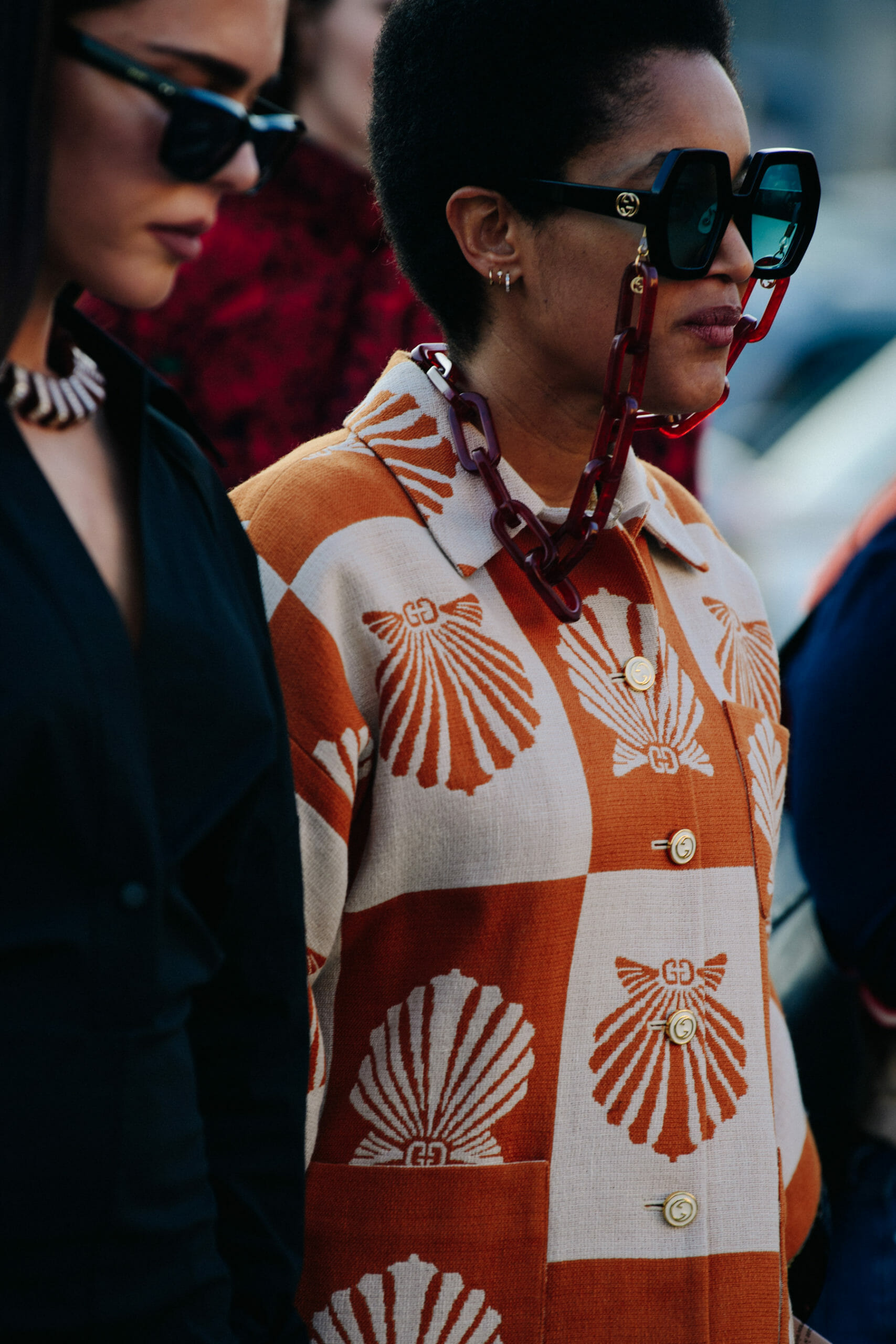 Woman wearing shell pattern shirt
