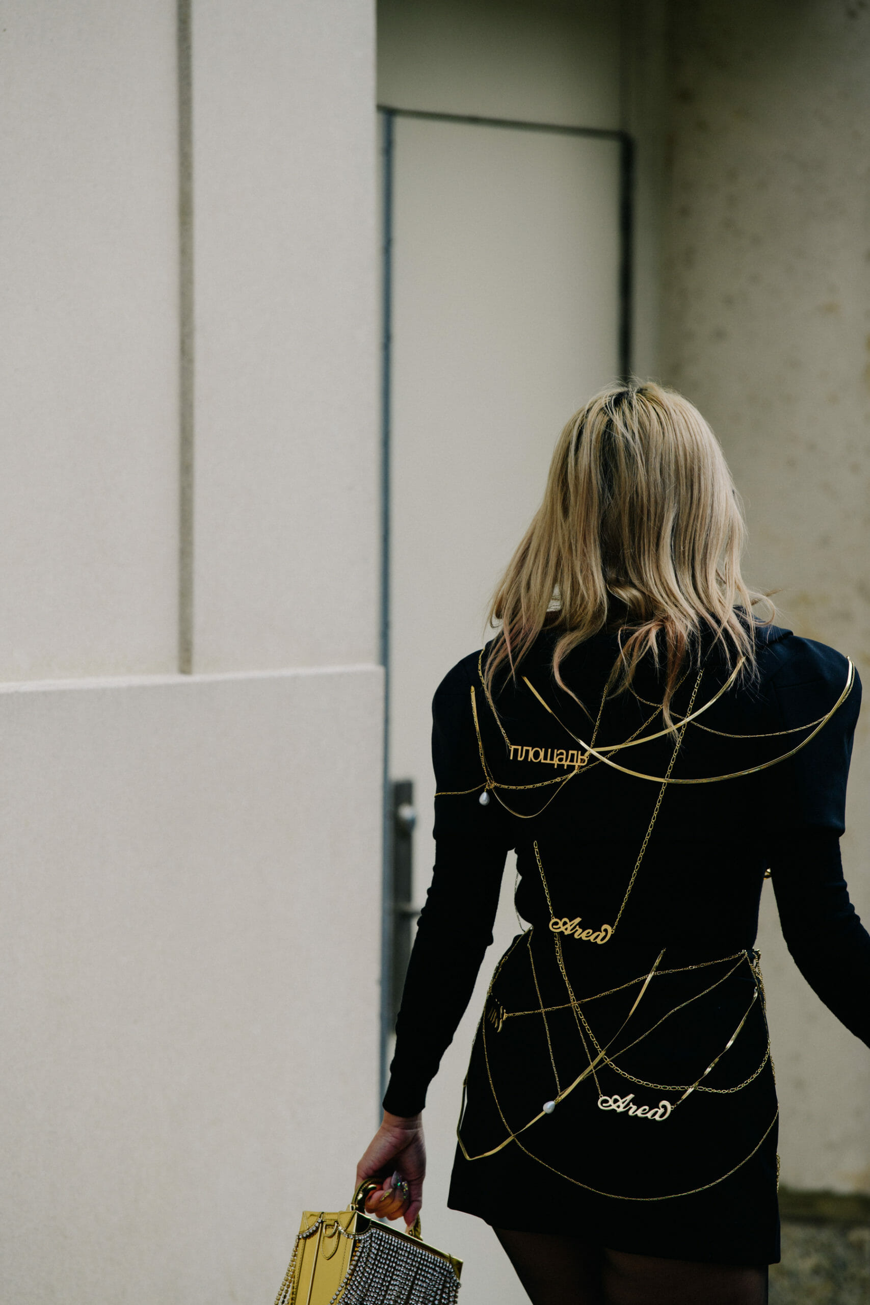 Woman wearing gold chains
